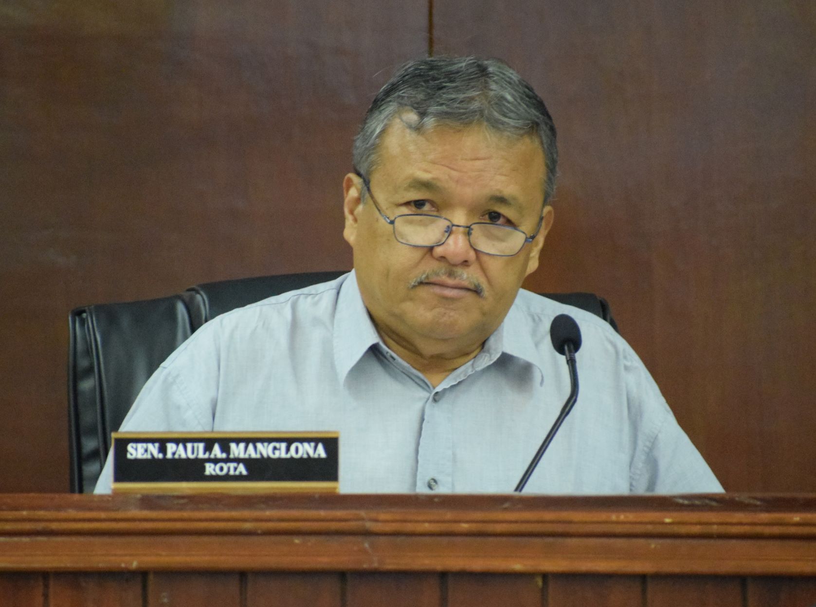 Sen. Paul A. Manglona attends a joint Senate committee meeting with officials of the Marianas Visitor Authority on Jan. 18, 2023, in the Senate chamber.