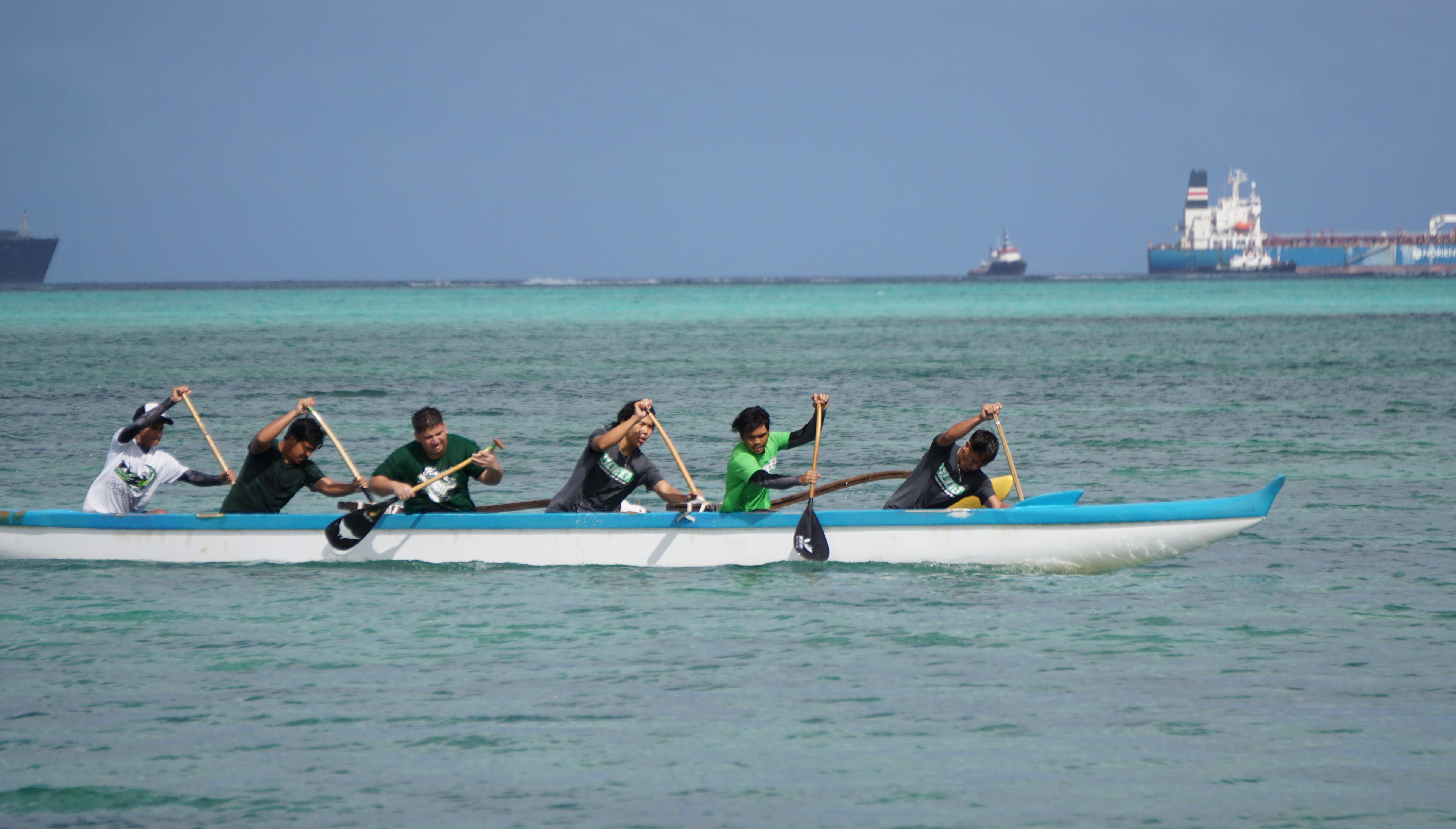 Saipan Southern High School's men's team pushes through for the finish during the no-point opener of the 2022-2023 season of the PSS Interscholastic Outrigger Race series on Saturday at Kilili Beach.