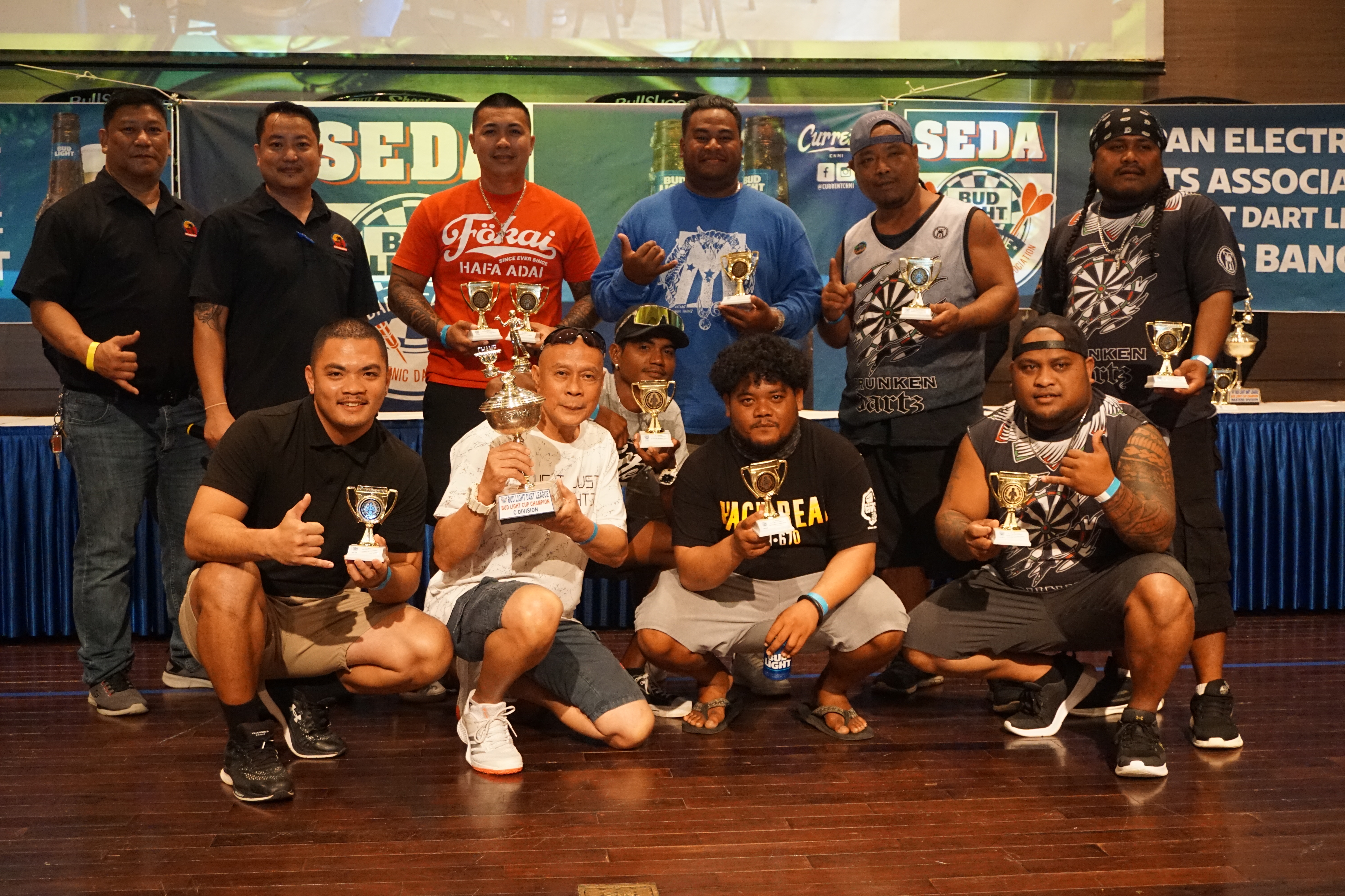 Tambayan Drunken Darts team members pose with the Bud Light Cup and other trophies they won for topping the C Division of the SEDA Bud Light Dart League. More information about the awards banquet will be featured in Variety’s next edition.