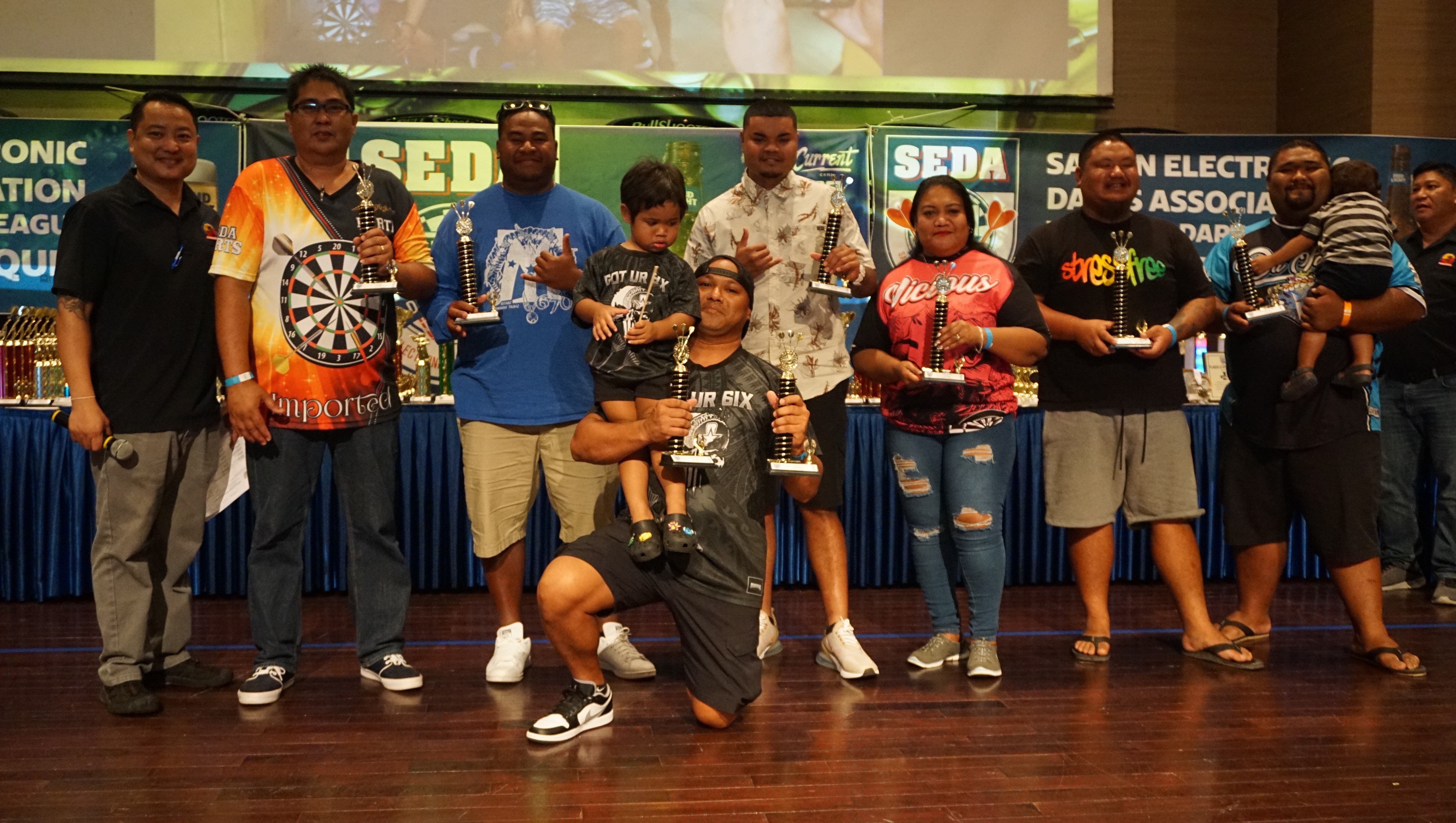 The Top Gun division winners pose for a photo during the awards banquet of the 2022 SEDA Bud Light Dart League at the Saipan World Resort Taga Hall on Sunday.