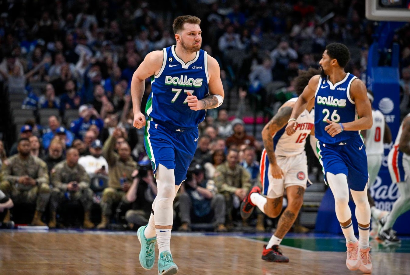 Dallas Mavericks guard Luka Doncic (77) runs back up the court after scoring against the Detroit Pistons during the second half at the American Airlines Center in Dallas, Texas, Jan. 30, 2023.