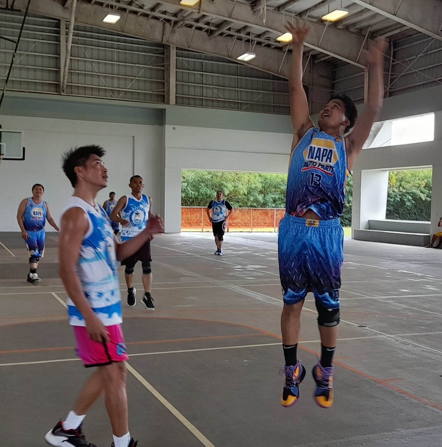 NAPA's JR Caraig takes the uncontested shot against Pacific Best Choice during  the open division knockout game of the Legends Sports Association Invitational Basketball League on Sunday at the Koblerville gym.