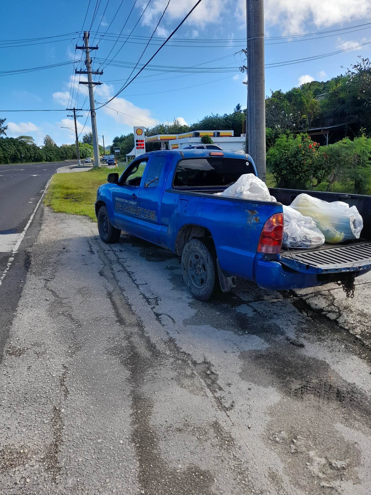 Max Aguon uses the pick-up truck donated by DPA Car Mart in San Antonio for his cleanup activities.