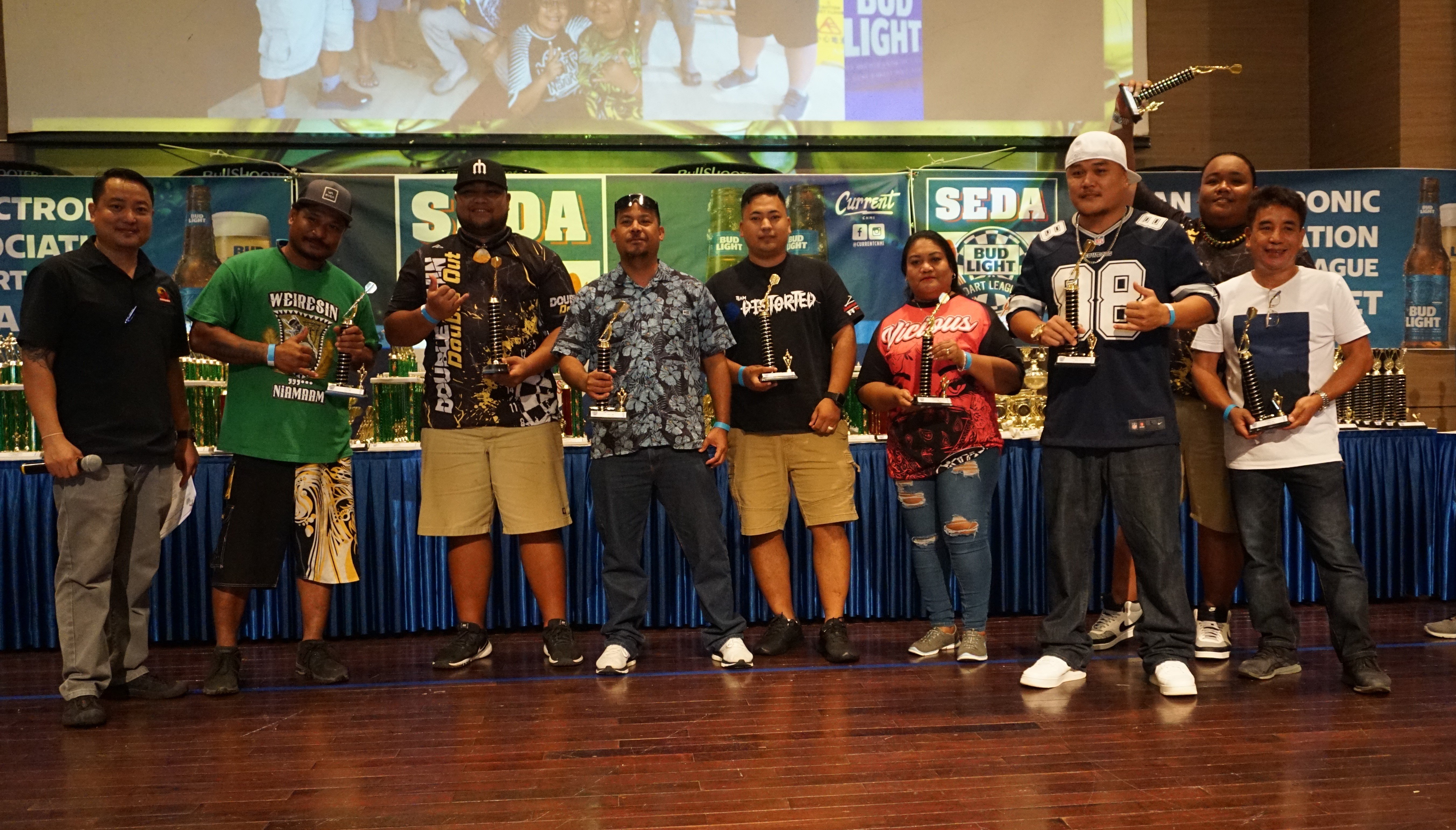 The Hi-In division winners pose for a photo during the awards banquet of the 2022 SEDA Bud Light Dart League at the Saipan World Resort Taga Hall on Sunday.