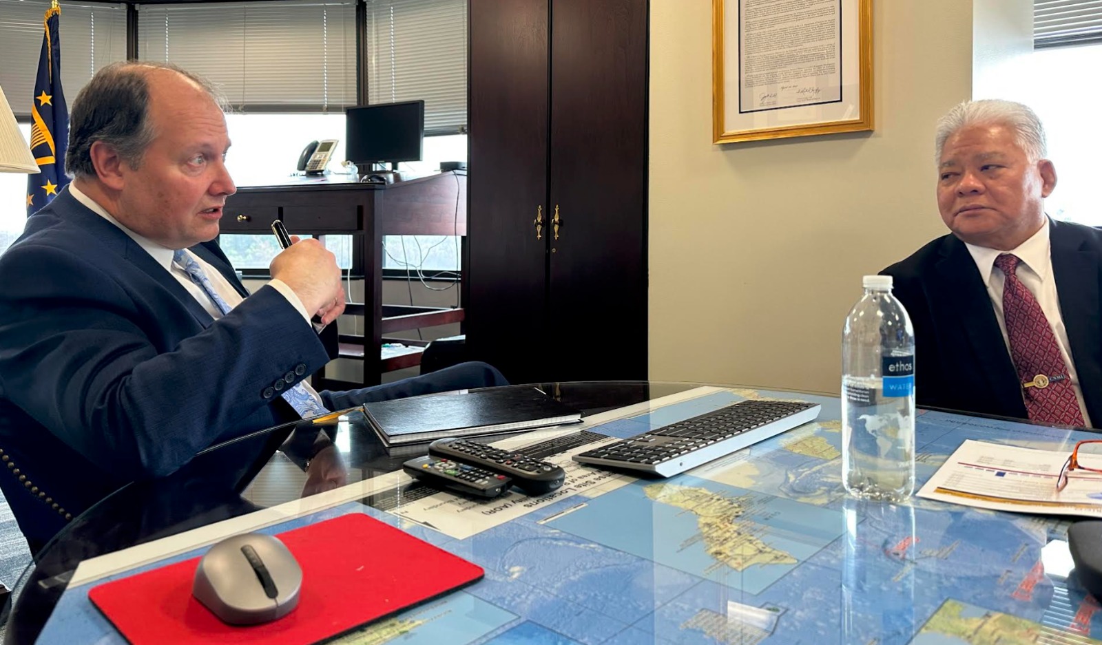 Patrick  J.  O'Brien,  left, director  of  the  U.S. Department of Defense-Office of Local Defense Community Cooperation, gestures as he speaks during a meeting with Gov. Arnold I. Palacios in Washington, D.C. last week.