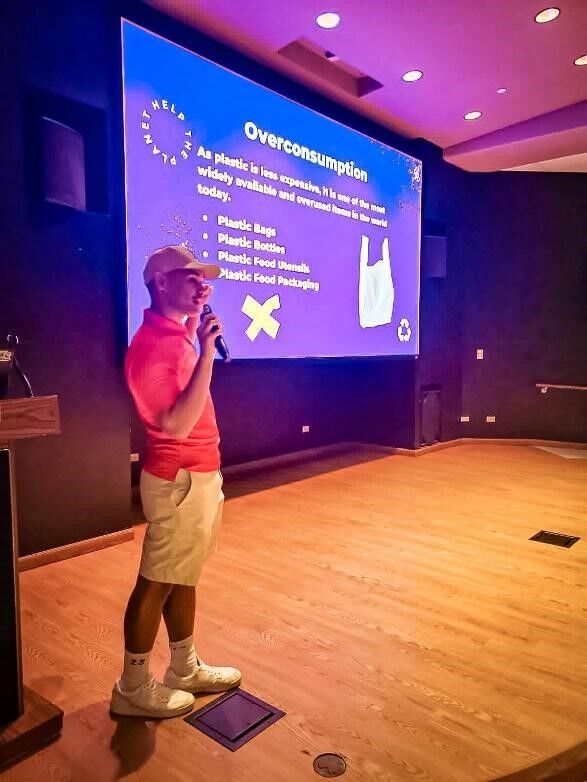 Joseph Nekaifes, MINA’s program assistant, presents on plastic pollution.