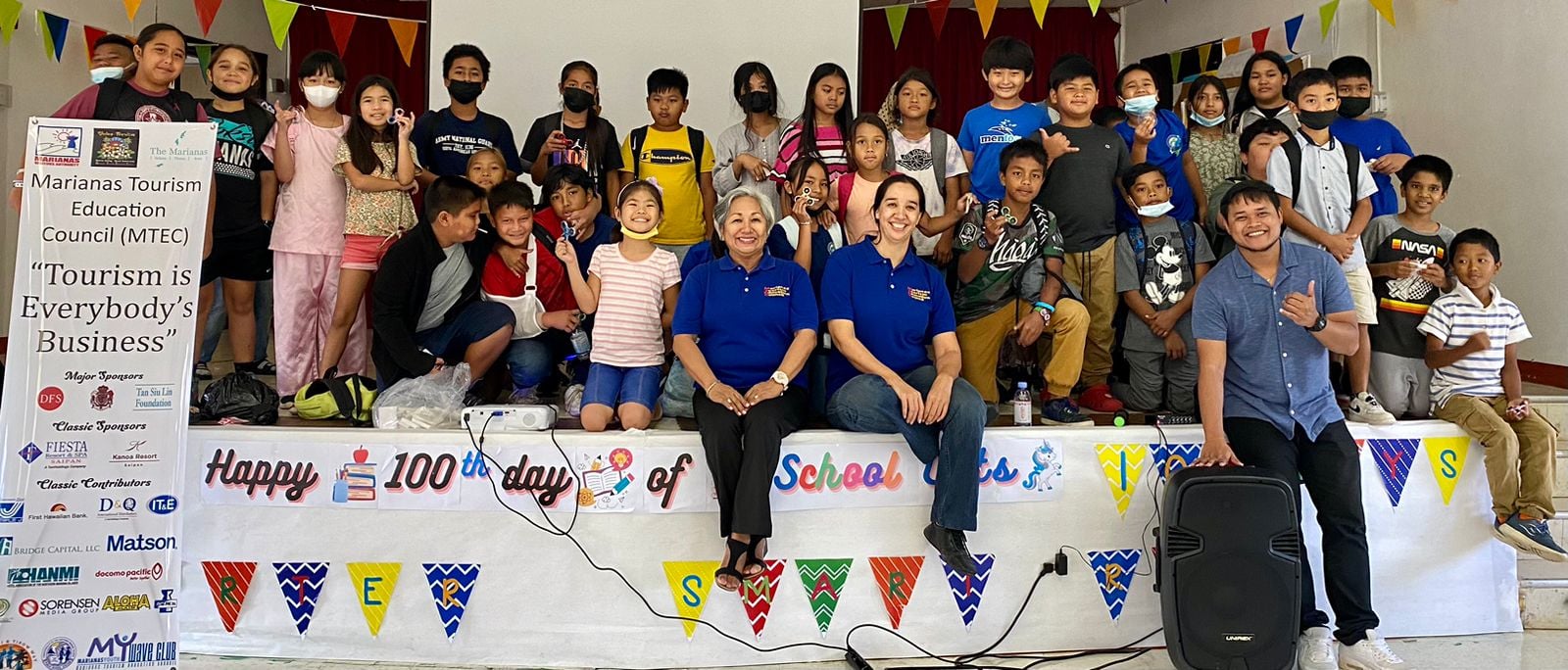 Fourth graders of Tinian Elementary School attend the presentation of the Marianas Tourism Education Council  and Marianas Visitors Authority at their school on Feb. 17, 2023. The presentation was led by MTEC Acting Chairwoman Vicky Benavente, center left in blue.