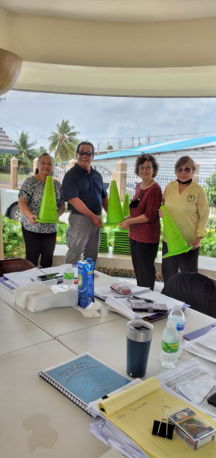 The Saipan and Northern Islands Municipal Council members turn over traffic cones to Saipan Mayor Ramon B. Camacho on Feb. 10, 2023.