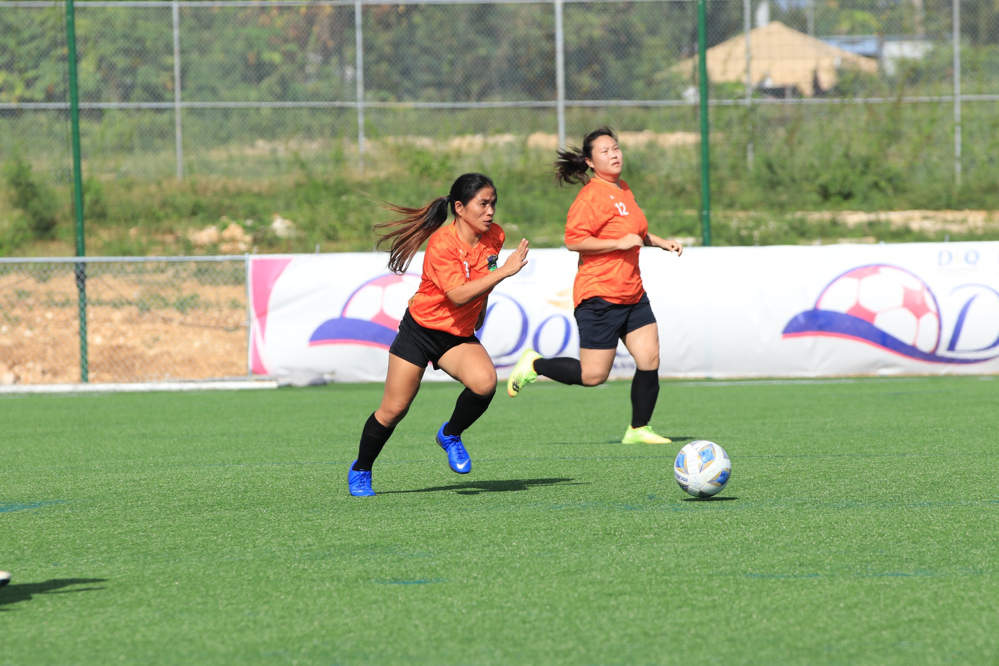 Kanoa's Jane Malabanan rushes to control the possession during a game in the Flores-Péé Luwal Division of the Dove Women’s League on Sunday at the NMI Soccer Training Center.