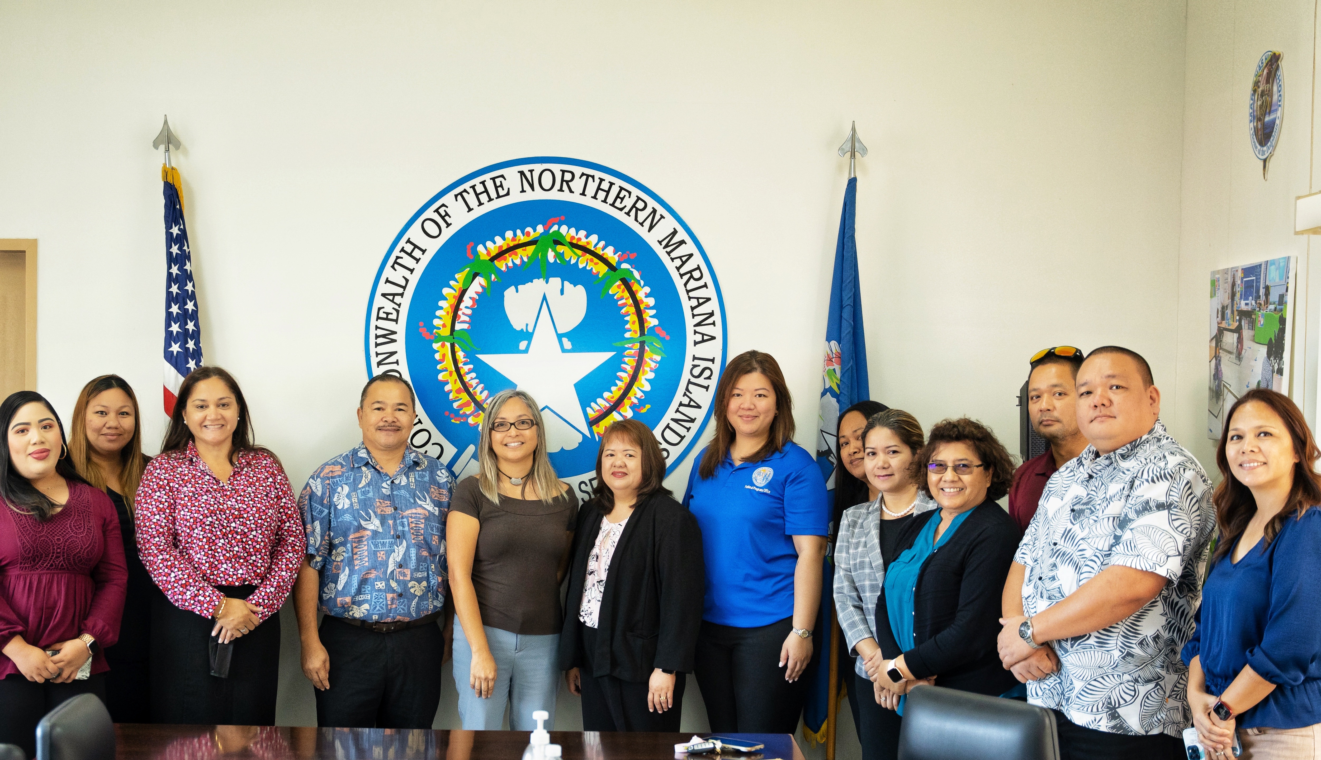 The Public School System leadership led by Commissioner of Education Dr. Alfred B. Ada pose for a photo with the new teacher representative, Dr. Dora Borja Miura.