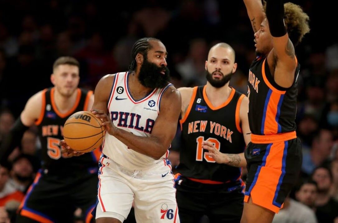 Philadelphia 76ers guard James Harden (1) controls the ball against New York Knicks center Isaiah Hartenstein (55) and guards Evan Fournier (13) and Miles McBride (2) during the fourth quarter at Madison Square Garden in New York, Feb. 5, 2023.
