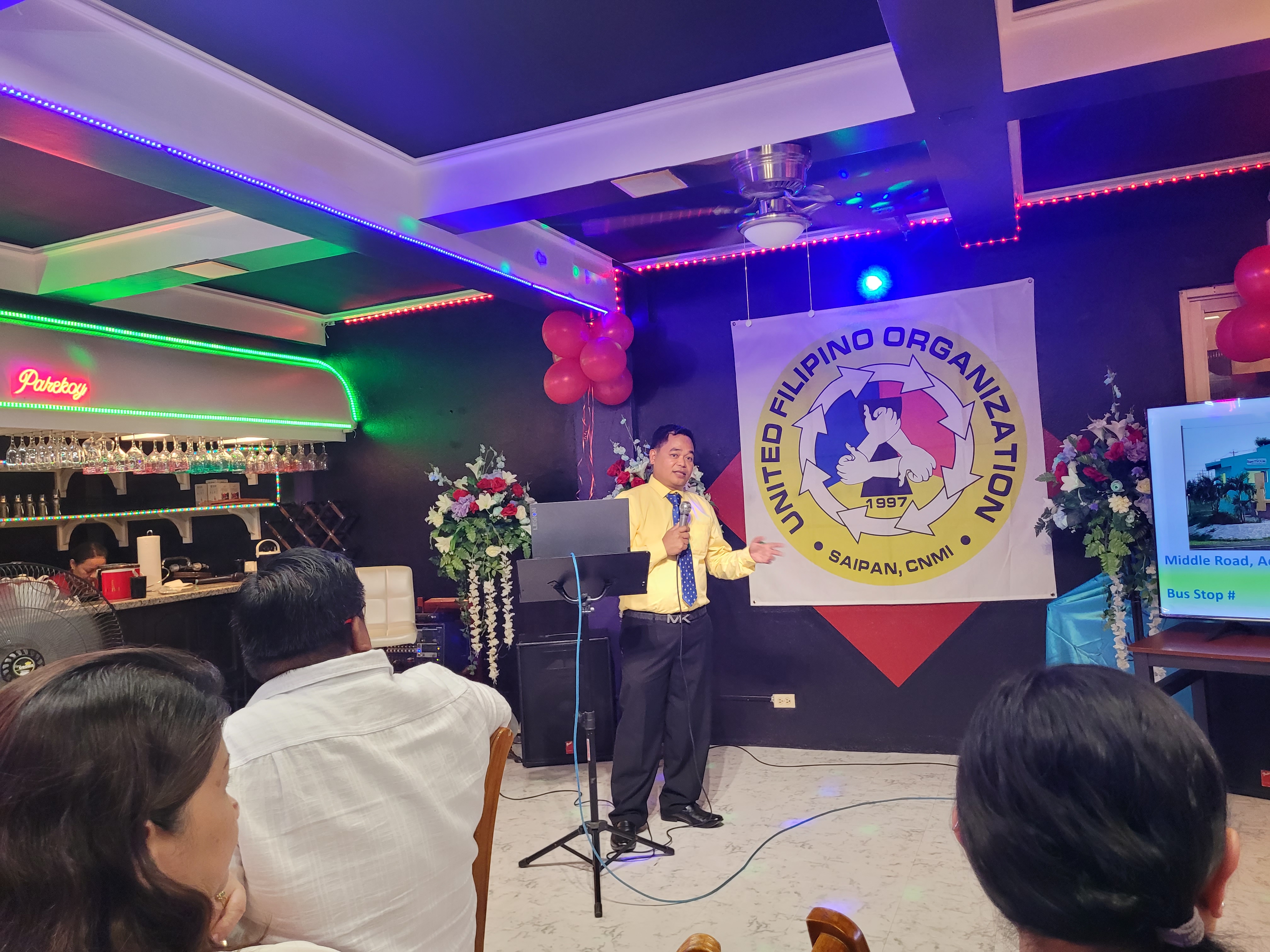 Former United Filipino Organization President Mar Masilungan talks about the group's accomplishments in the past two years during a meeting on Saturday  at Chowtime Restaurant in Garapan.