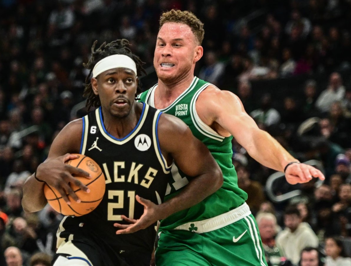 Milwaukee Bucks guard Jrue Holiday (21) drives for the basket against Boston Celtics forward Blake Griffin (91) in the second quarter at Fiserv Forum in Milwaukee, Wisconsin, Feb. 14, 2023.