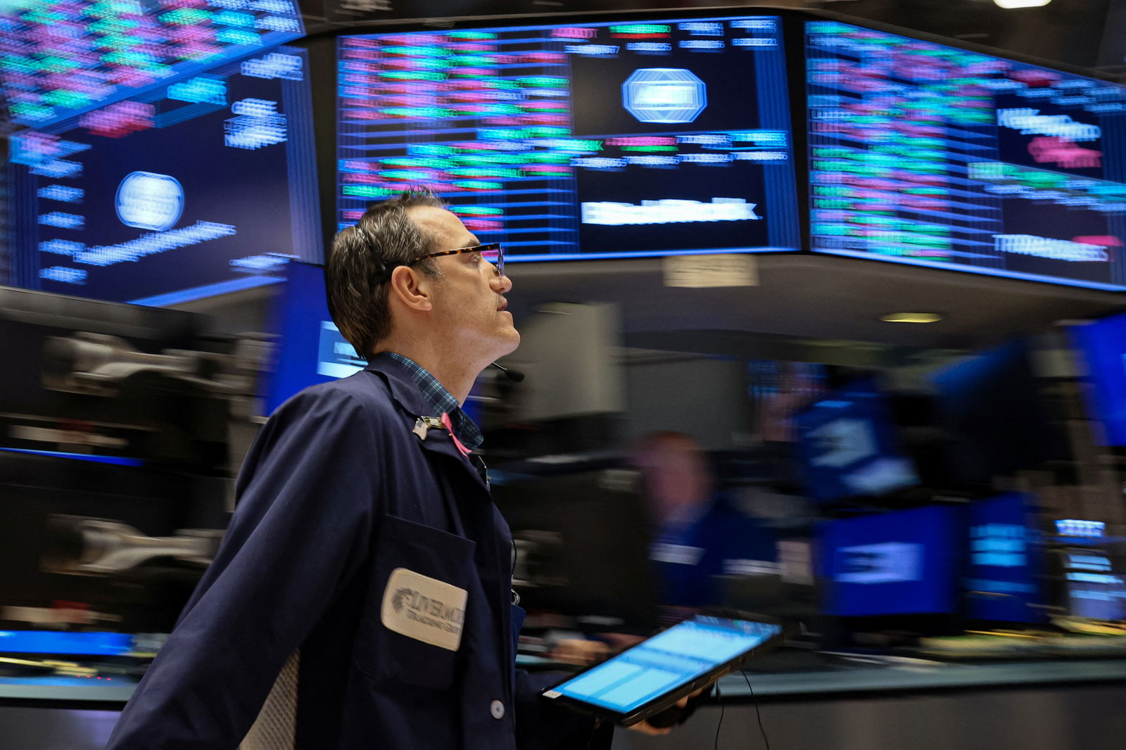 A trader works on the floor of the New York Stock Exchange in New York City, Feb. 17, 2023.