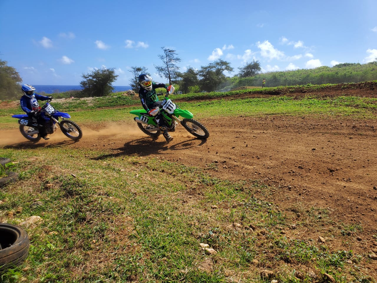 Cuki Alvarez executes a turn as Dave Celis trails closely behind during round 1 of the 2023 MRA Points Race Series at the Cowtown Raceway Park on Sunday.