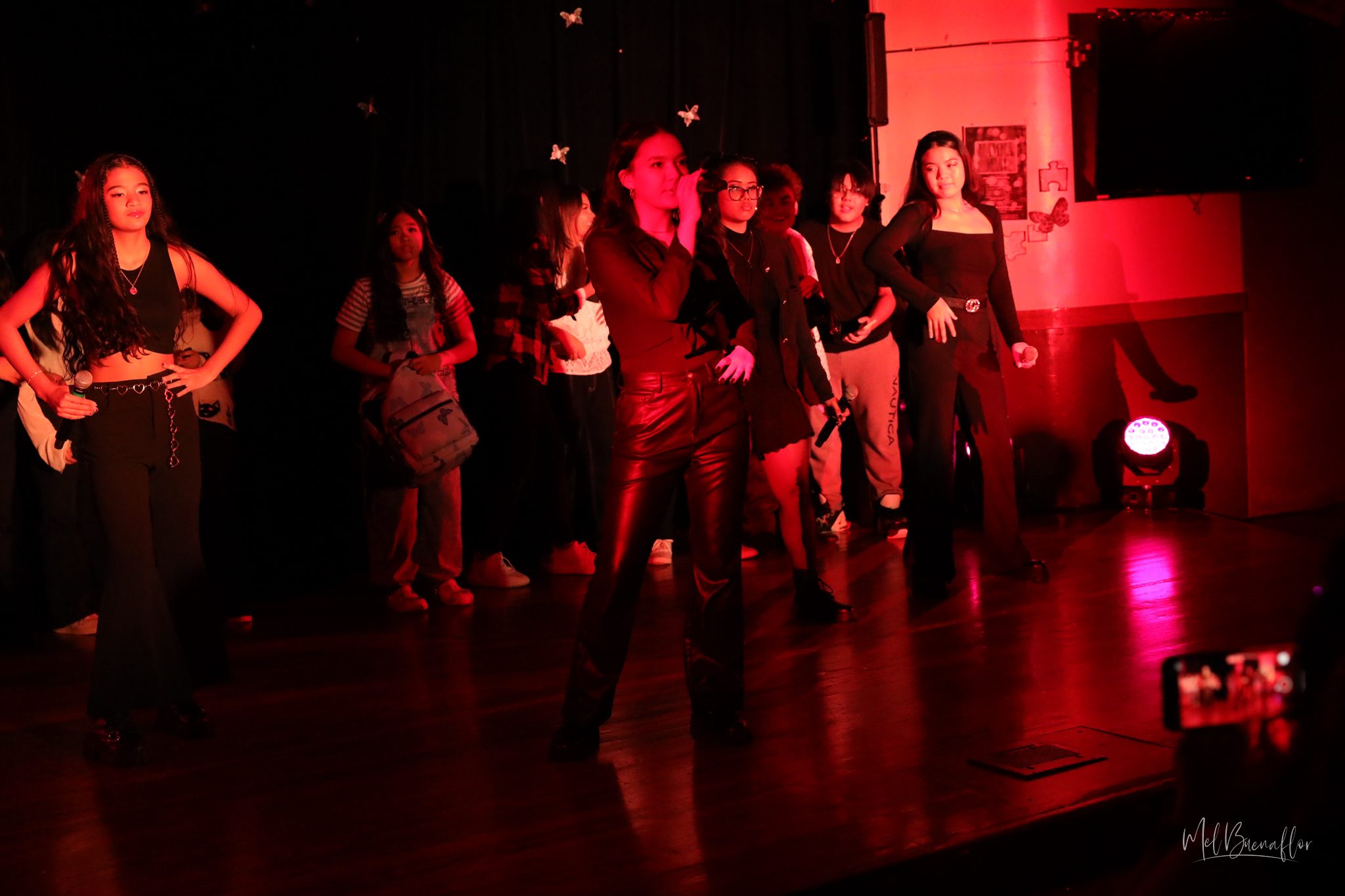 Regina, played by Brissa Concepcion Hunter, front, leads her court of Mean Girls in singing “7 Rings.”