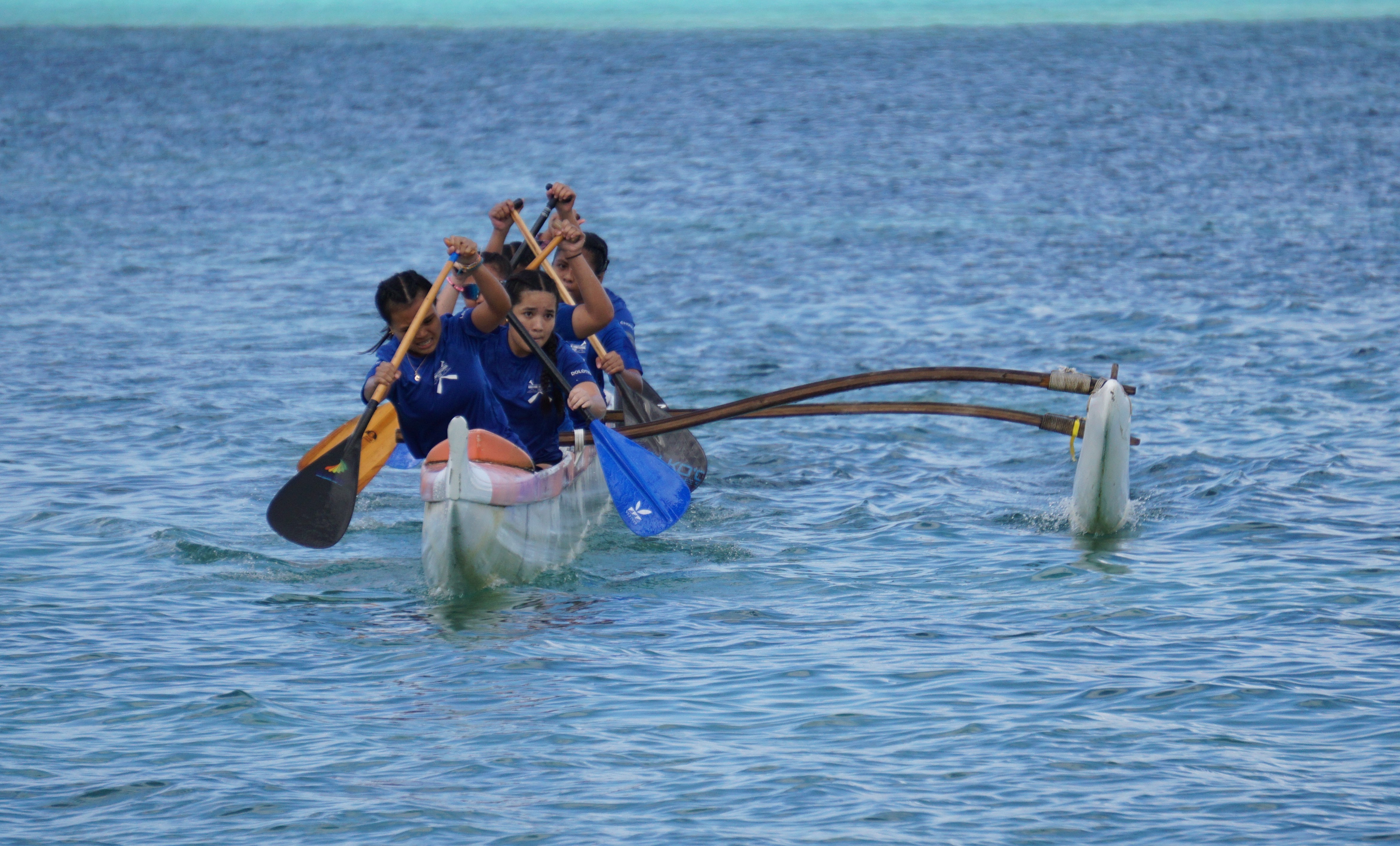 The MHS girls team rush to the finish line during a 500m event of the PSS Interscholastic Outrigger Race Series at Kilili Beach.