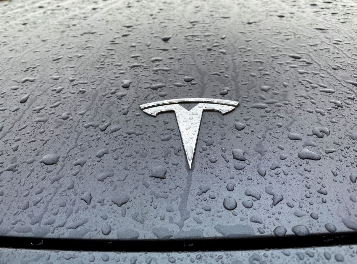 A view shows the Tesla logo on the hood of a car in Oslo, Norway Nov. 10, 2022.
