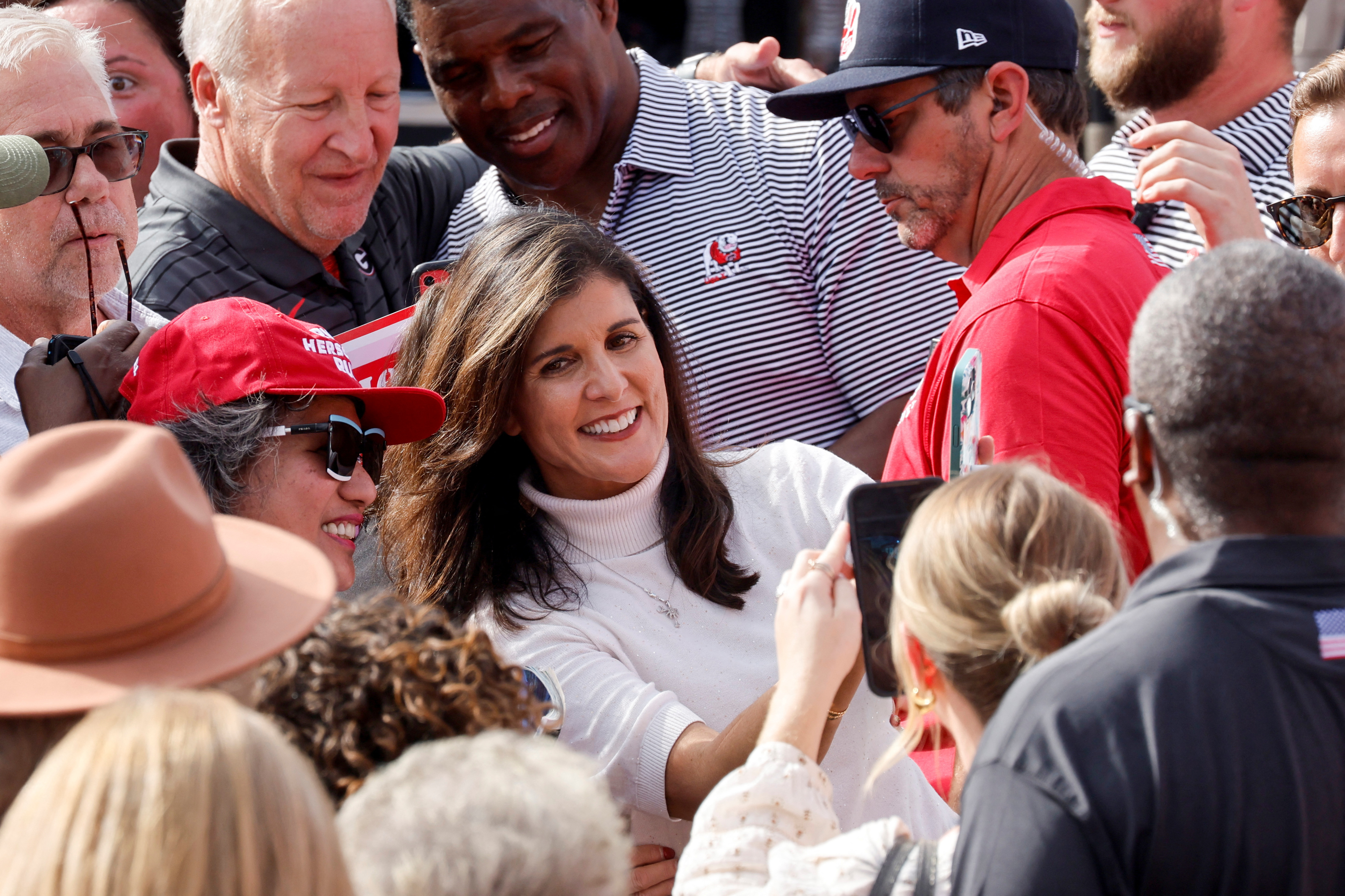 Former Trump administration U.S. Ambassador to the U.N. Nikki Haley campaigns for Georgia Republican candidate for U.S. Senate Herschel Walker at a rally with supporters in Hiram, Georgia, Nov. 6, 2022.