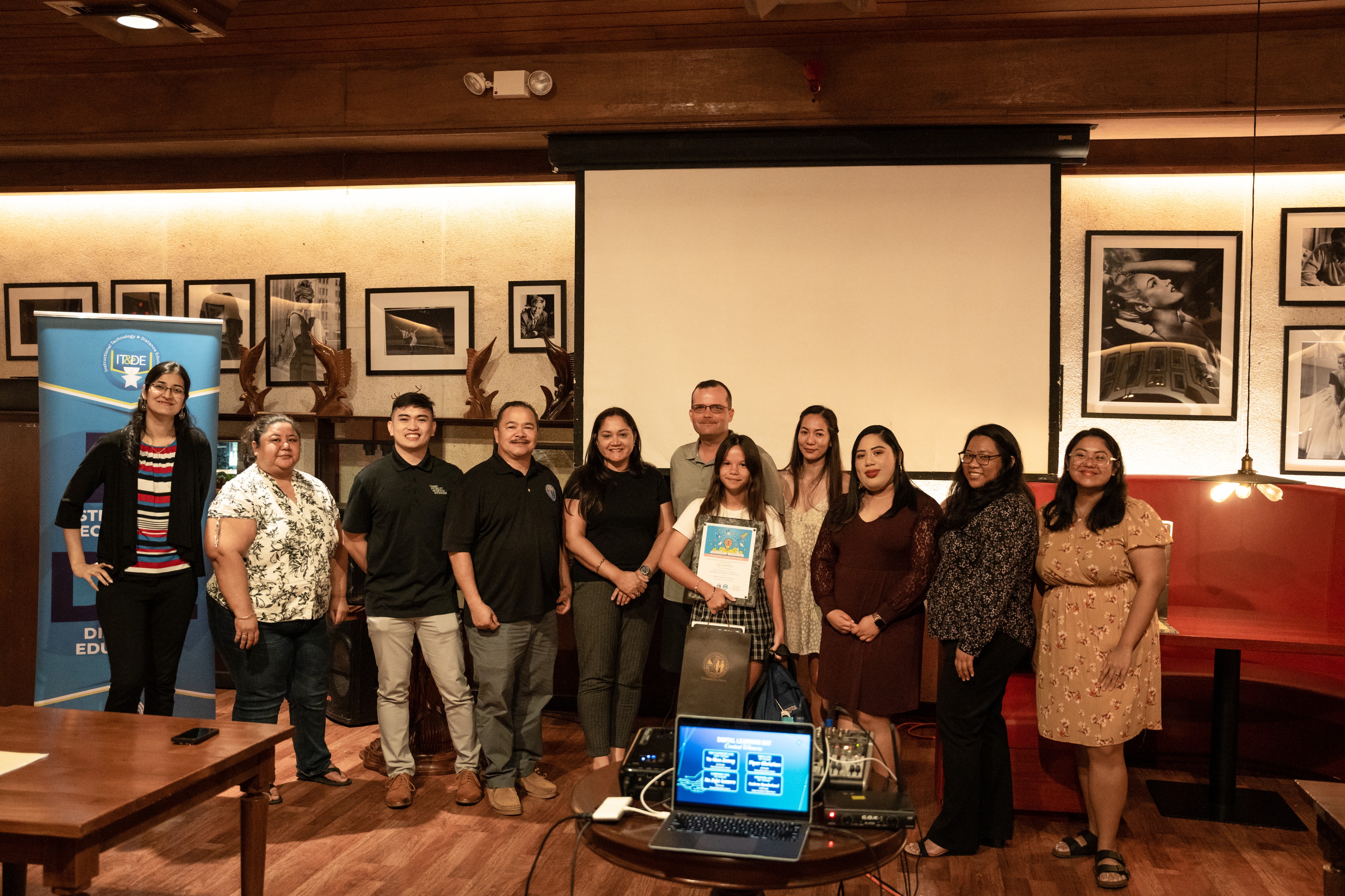 Piper Christian, a 6th grader from Tinian Elementary School, topped the 6th-8th grade level. With her are her parents, school principal, Commissioner of Education Dr. Alfred B. Ada, Instructional Technology and Distance Education Interim Director Lorraine Catienza, Special Education Director Donna Flores, and Communications and Media Coordinator Randee-Jo Barcinas-Manglona.
