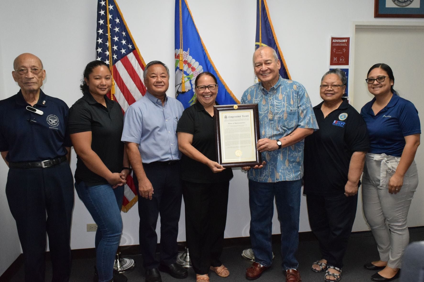 U.S. Congressman Gregorio Kilili Sablan, third right, and ESGR CNMI area chair, Rita A. Sablan, center, hold a plaque of recognition on Tuesday. Also in photo are David M. Sablan Sr., U.S. Army veteran Dayna Sunderland, Civilian Aide to the U.S. Secretary of Army Mike Sablan, ESGR outreach coordinators Rose Igitol and Joshlyn Lieto Blas.