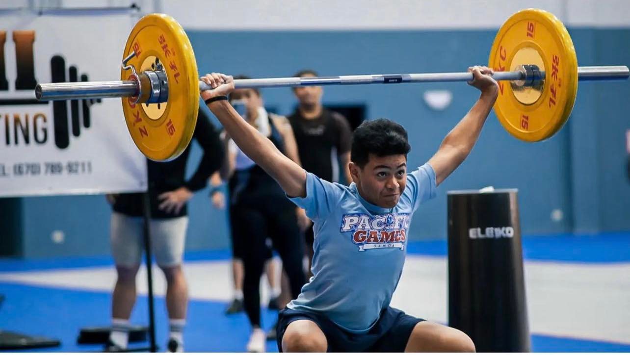 Jaden Andrew in action during the snatch portion of the qualifier competition hosted by CNMI Weightlifting last month.
