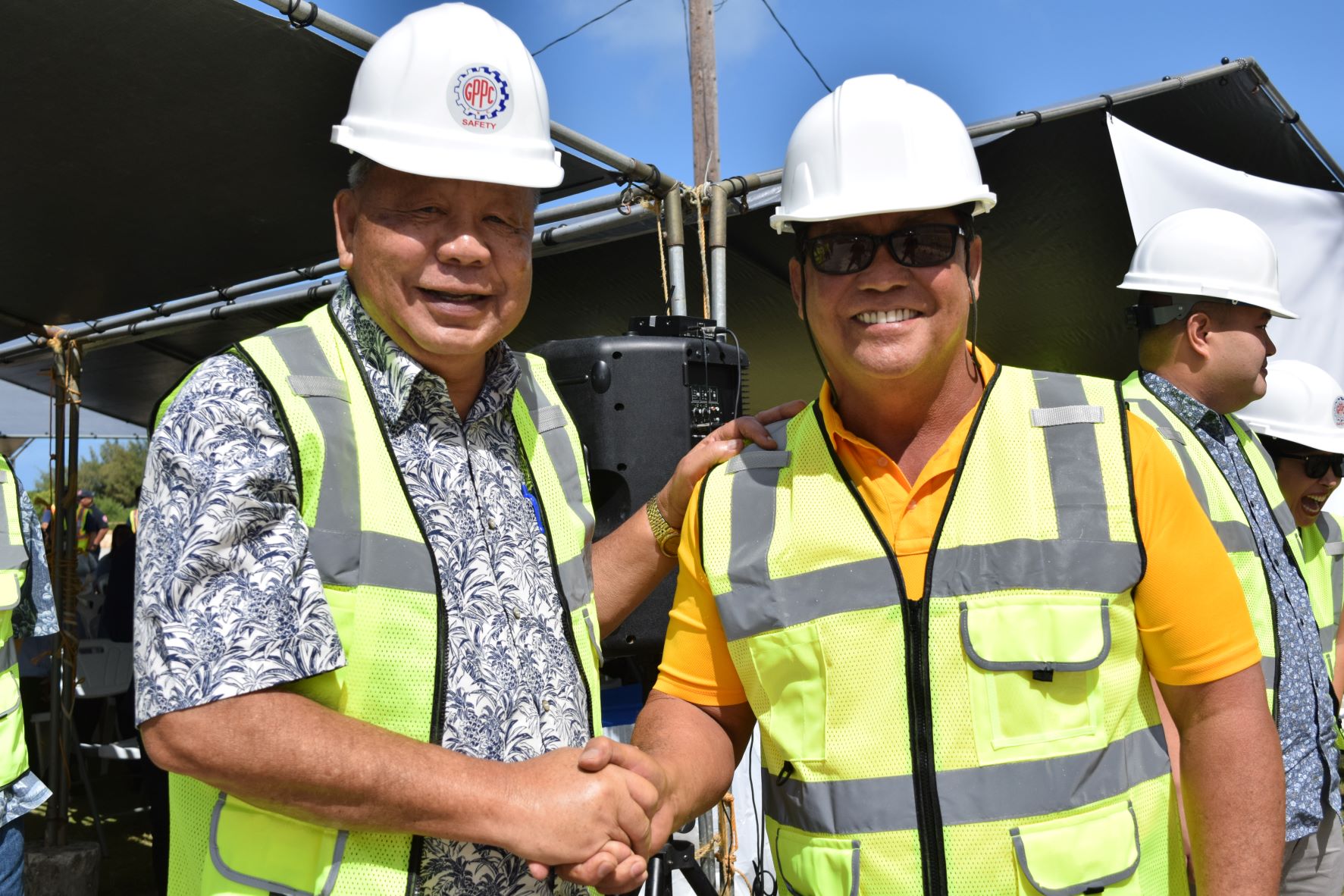 Lt. Gov. David M. Apatang and Saipan Mayor Ramon B. Camacho shake hands during the groundbreaking ceremony for the Beach  Road Improvement Project at the Garapan Fishing Base on Monday.