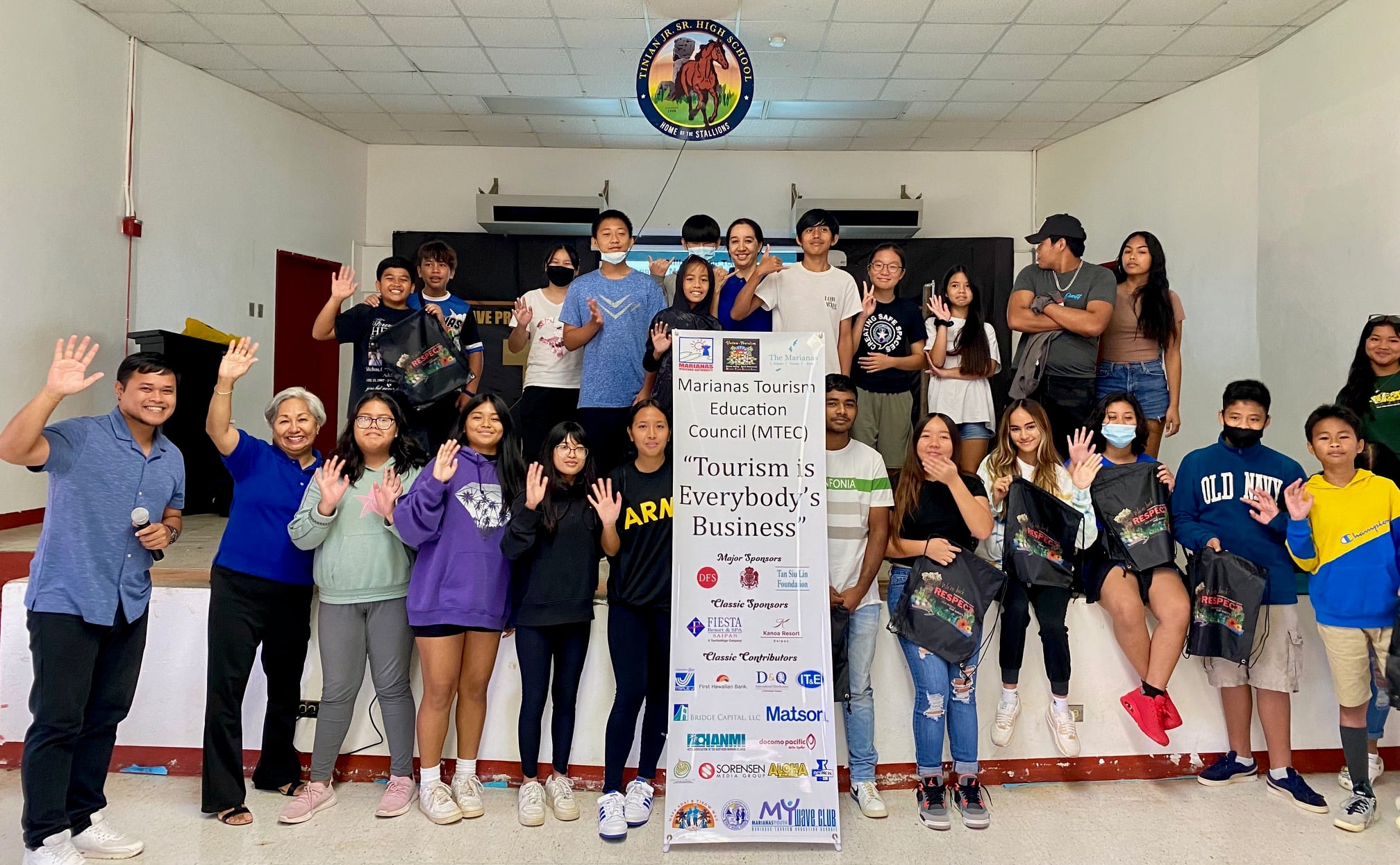 Students of Tinian High School attend the presentation of the Marianas Tourism Education Council and Marianas Visitors Authority at their school on Feb. 17, 2023. The presentation was led by MTEC Acting Chairwoman Vicky Benavente, front row, second left.