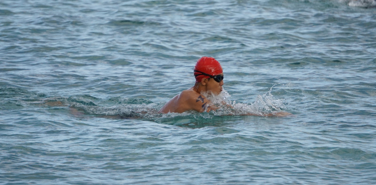 Richard Zhao leads the 500m race of the Tan Holdings 50th Anniversary Ocean Swim on Saturday.