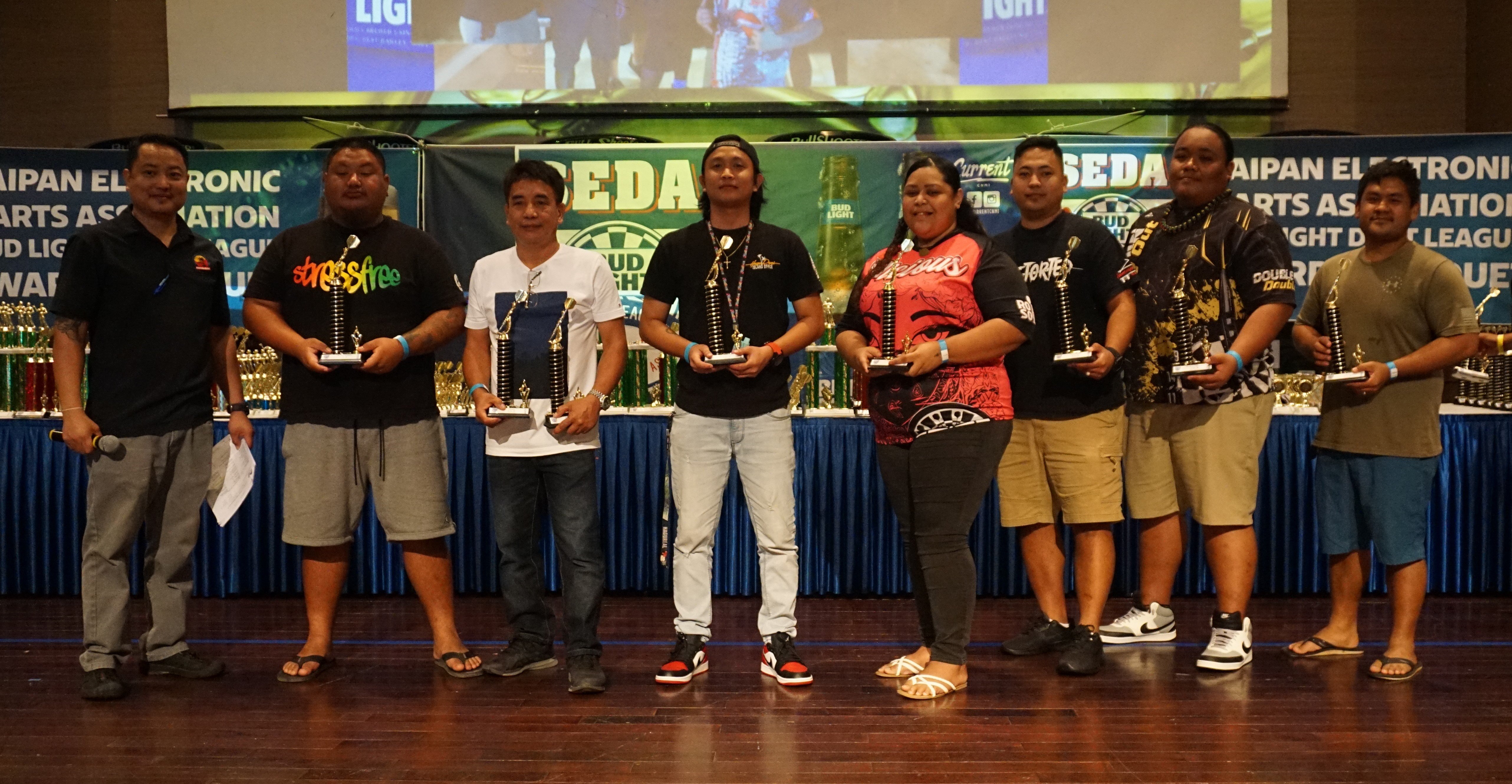 The Hi-Out awardees of each division pose for a photo during the awards banquet of the 2022 SEDA Bud Light Dart League at the Saipan World Resort Taga Hall on Sunday.