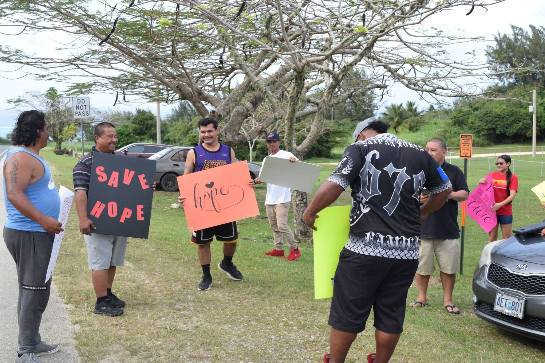 Former Hinemlu Ohala Para Enteramenti or HOPE Recovery Center participant Jun Santos, second right, talks with other residents during the “Rally for HOPE” on Capital Hill Friday.