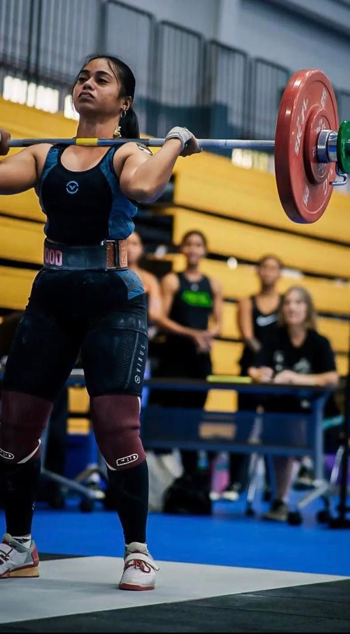 Cheyanne Manuel prepares for the second portion of the clean & jerk during the qualifier competition hosted by CNMI Weightlifting last month.