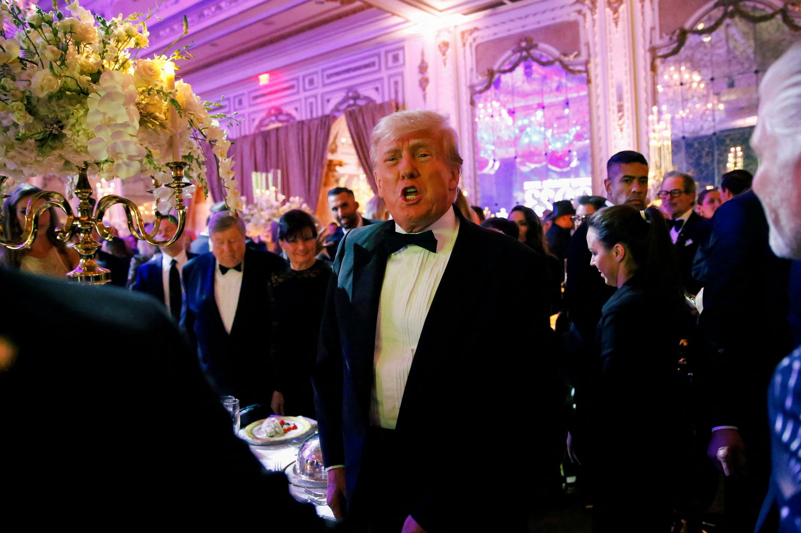 Former President Donald Trump, who announced a third run for the presidency in 2024, hosts a New Year's Eve party at his Mar-a-Lago resort in Palm Beach, Florida, Dec. 31, 2022.