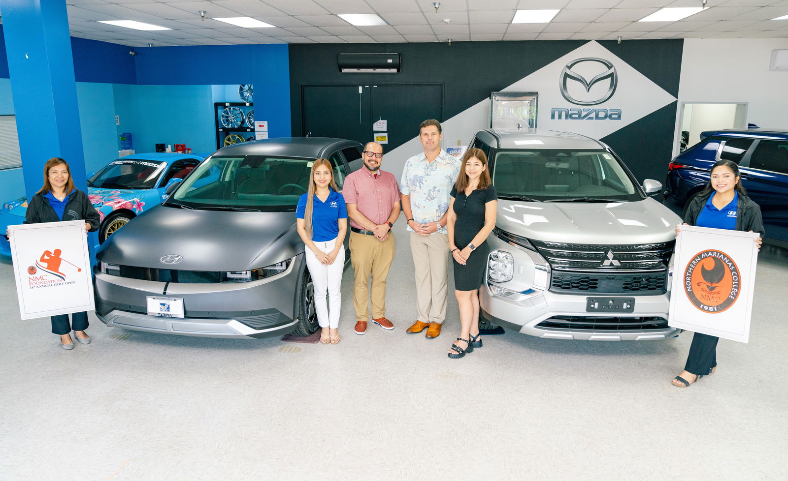 Triple J Motors Saipan offers a brand new 2023 Hyundai IONIQ 5 SEL with Navigation and AWD and a brand new 2023 Mitsubishi Outlander as hole-in-one prizes for NMC Foundation’s Golf Open on March 18 and 19, 2023. In photo with NMC President Galvin Deleon Guerrero, EdD is Triple J Motors General Manager Sean Ficke and Triple J Motors staff.