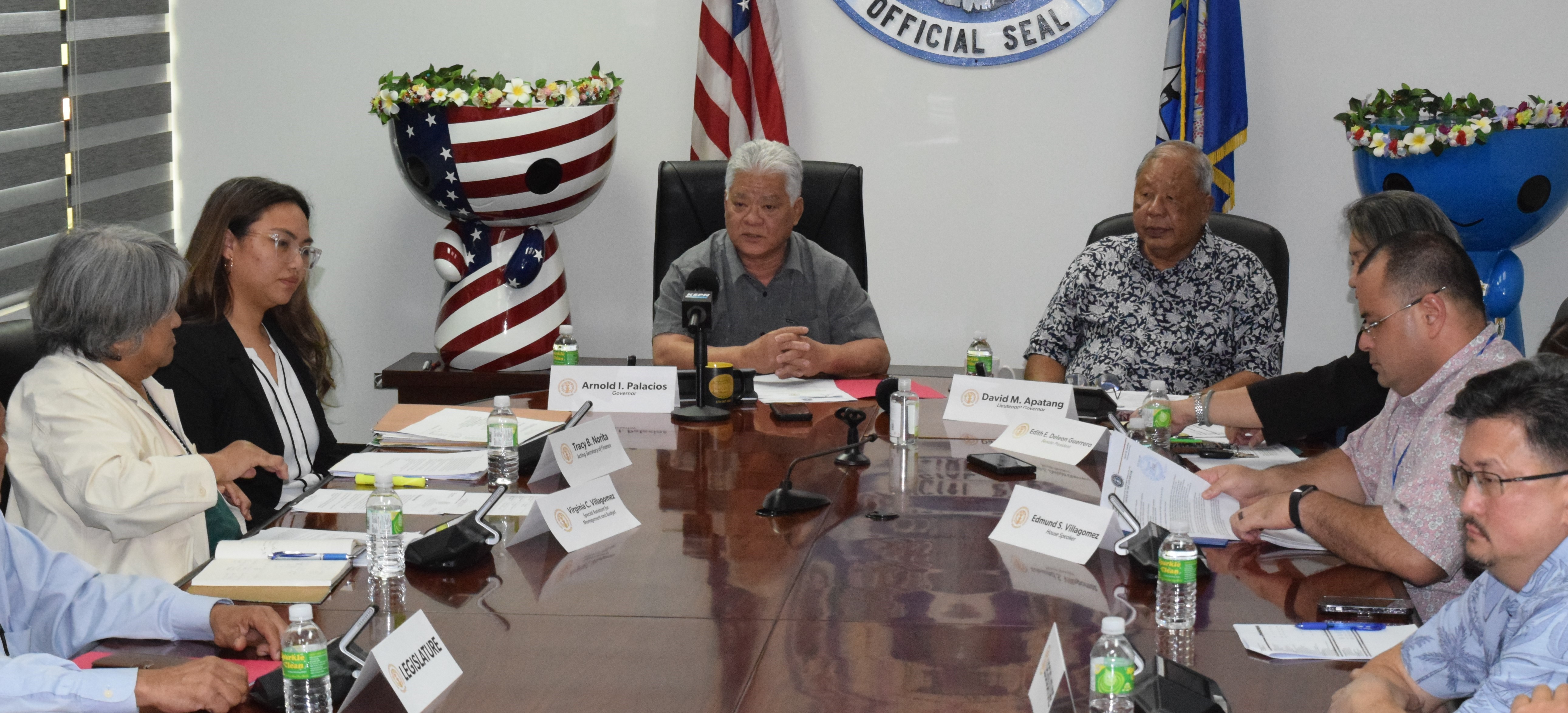 Gov. Arnold I. Palacios, center, speaks as Lt. Gov. David M. Apatang, fourth right, listens during a press conference on Wednesday. Also in photo are Special Assistance for Management and Budget Vicky Villagomez, acting Finance Secretary Tracy B. Norita, Senate President Edith Deleon Guerrero, partly hidden, Speaker Edmund S. Villagomez, and House Floor Leader Edwin Propst.