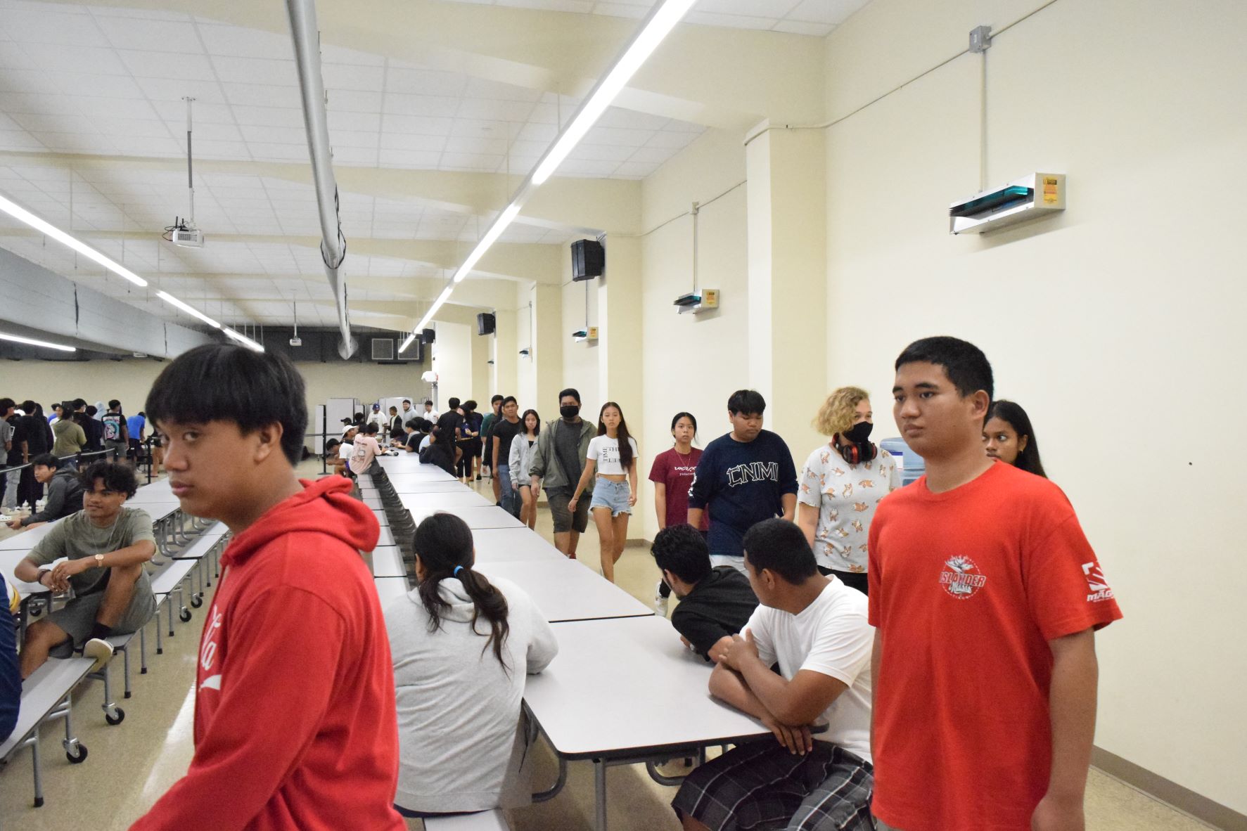 Marianas High School student line up  to cast their votes in the Youth Congress election on Monday in the MHS cafeteria.