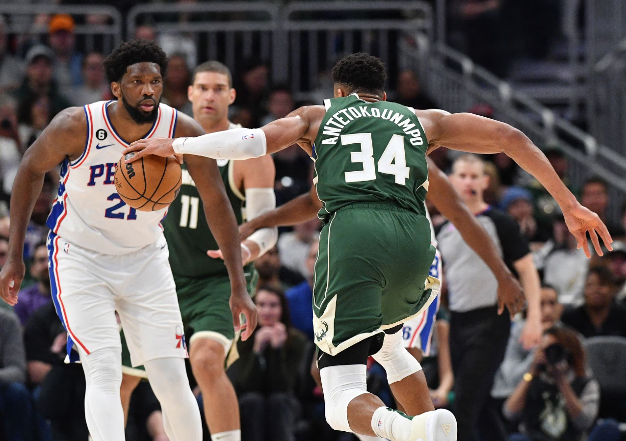 Milwaukee Bucks forward Giannis Antetokounmpo (34) drives to the basket against Philadelphia 76ers center Joel Embiid (21) in the second half at Fiserv Forum in Milwaukee, Wisconsin, March 4, 2023.