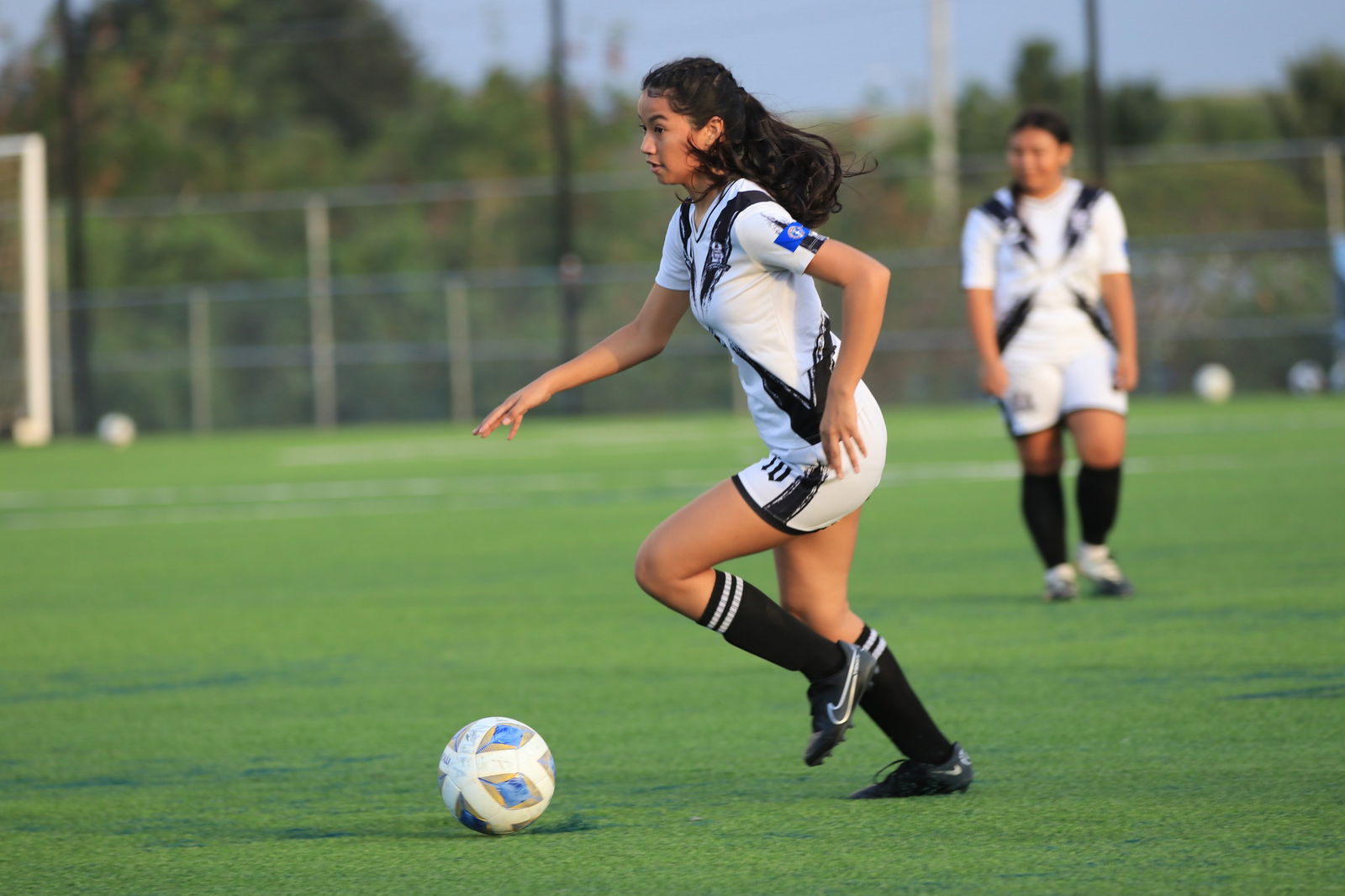 Southern United's Keisha Deleon Guerrero pushes forward as she sets up the offensive play during a Flores-Pee Luwal Division game of the Dove Women's League at the NMI Soccer Training Center.