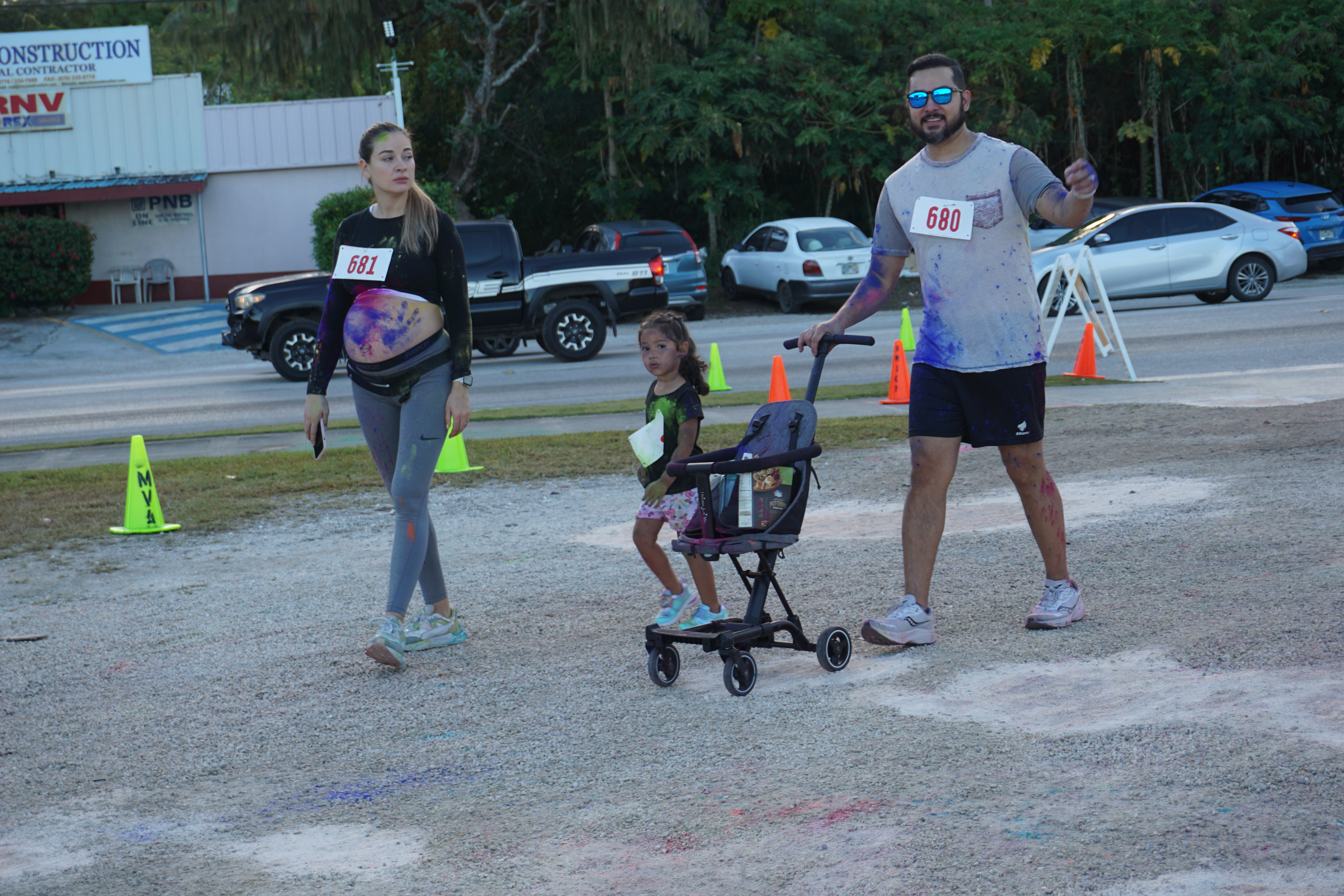 Perry Inos, his wife and daughter near the finish line.