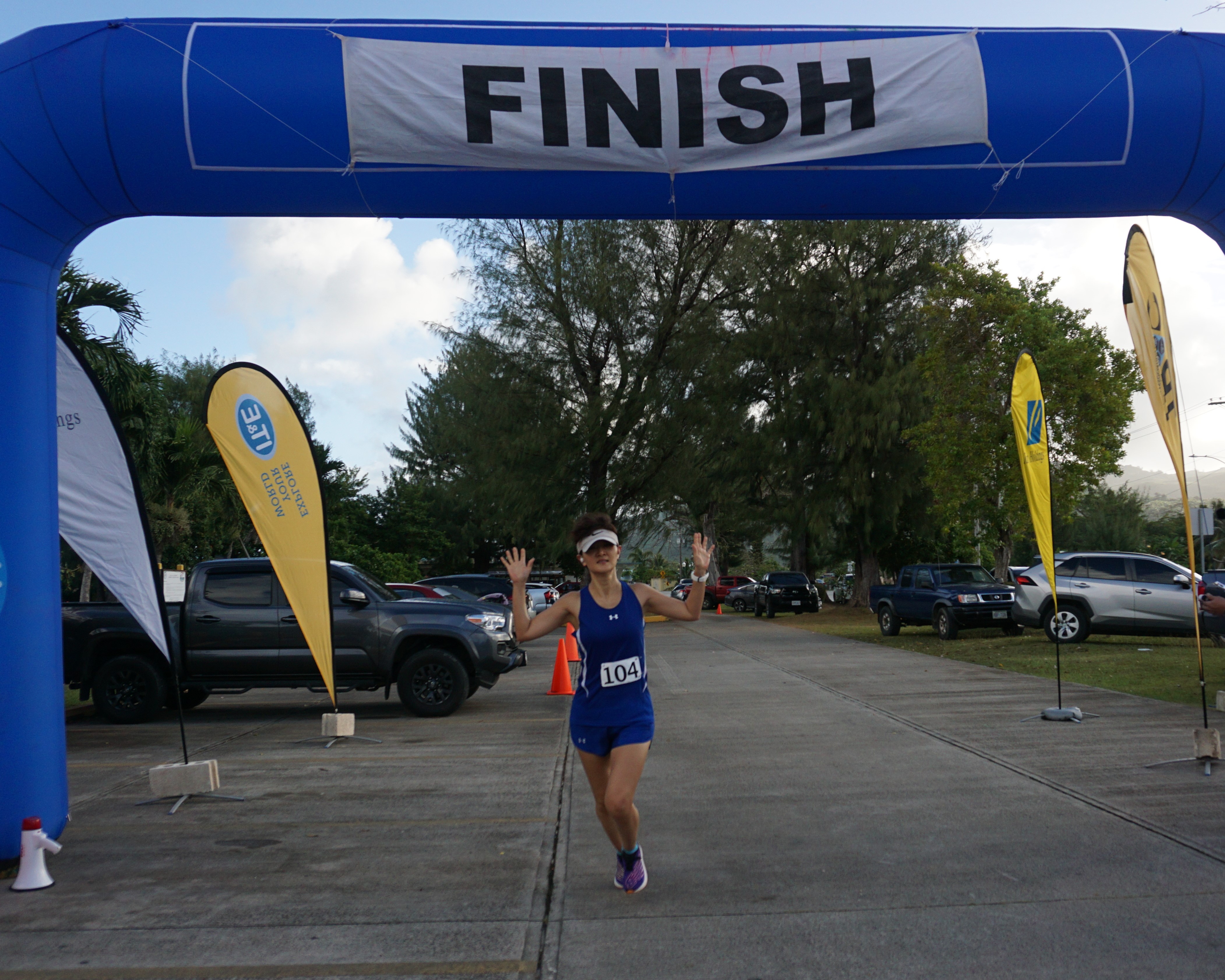 Ann Bang crosses the finish line of the Triathlon Association of the CNMI’s 8th Aquathlon & 10K Pathway Run in the Kilili Beach Park area on Saturday.