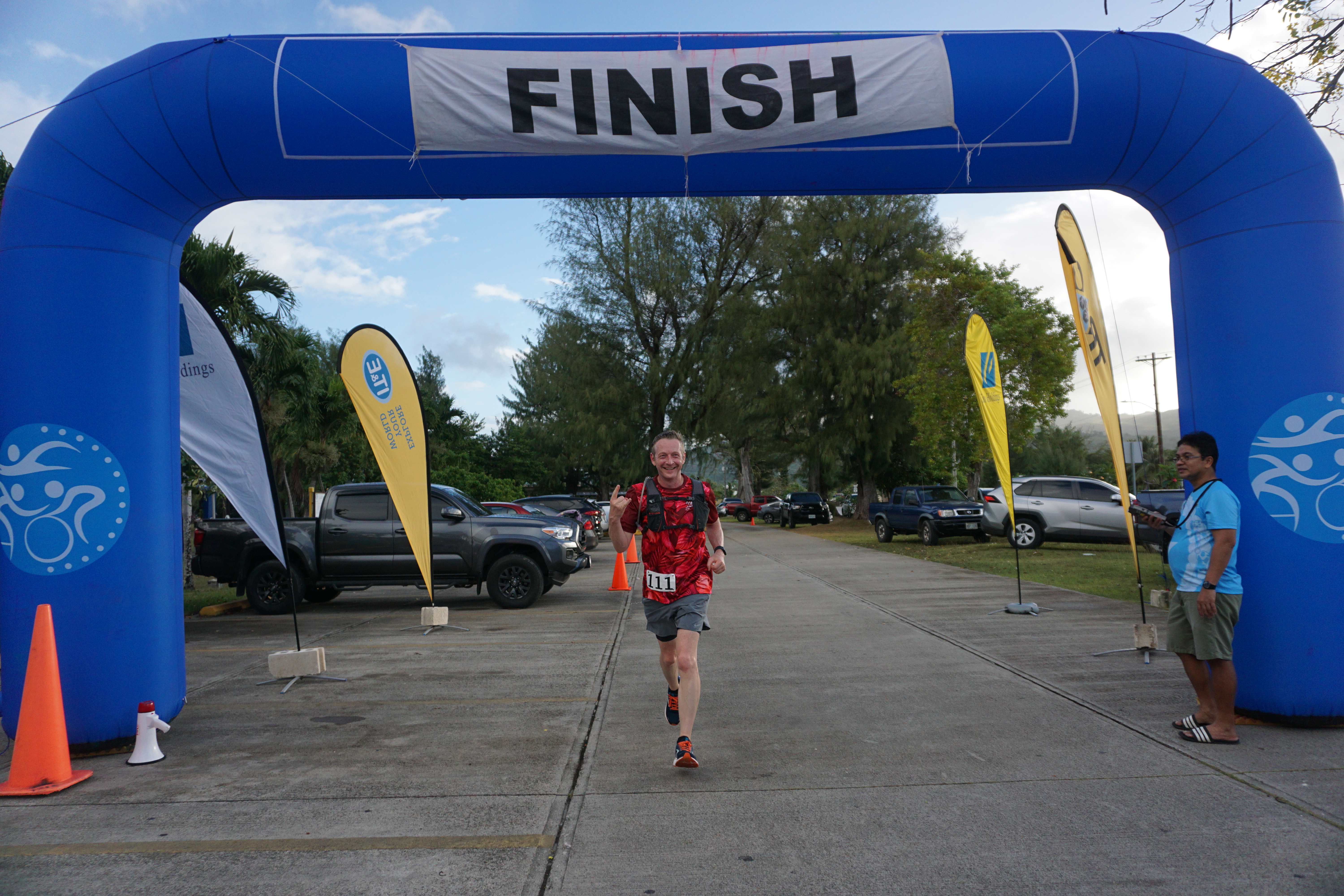 Jason Carman smiles as he finishes first overall in the Triathlon Association of the CNMI’s 8th Aquathlon & 10K Pathway Run in the Kilili Beach Park area on Saturday.