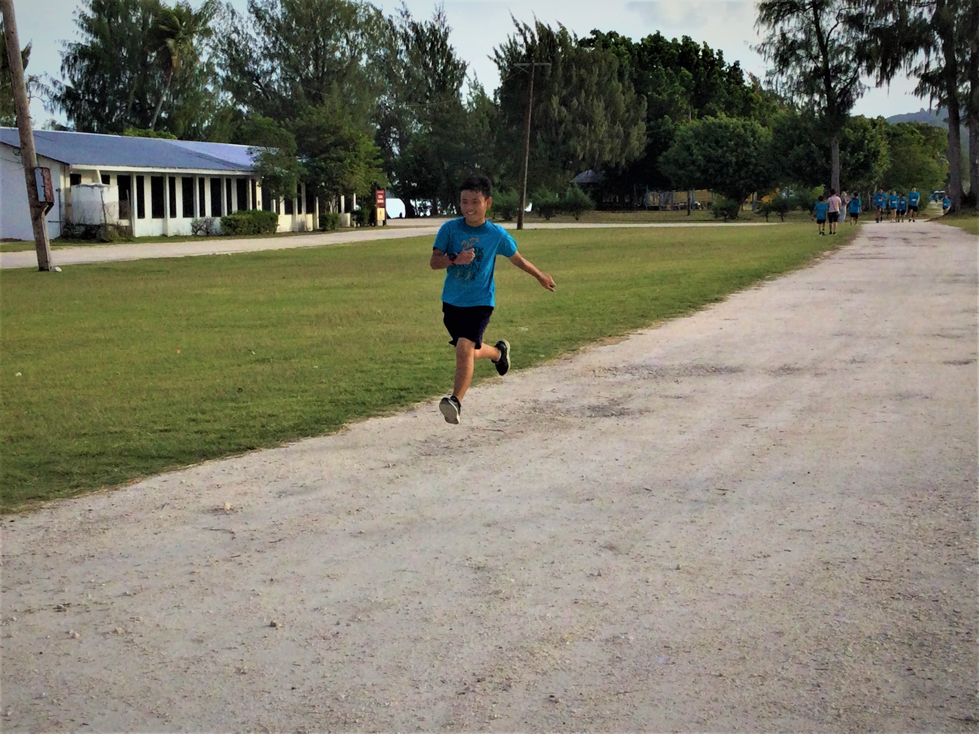 A young participant heads to the finish line at the Civic Center during the Saipan Seventh-day Adventist School 5K Hope Run on Sunday.