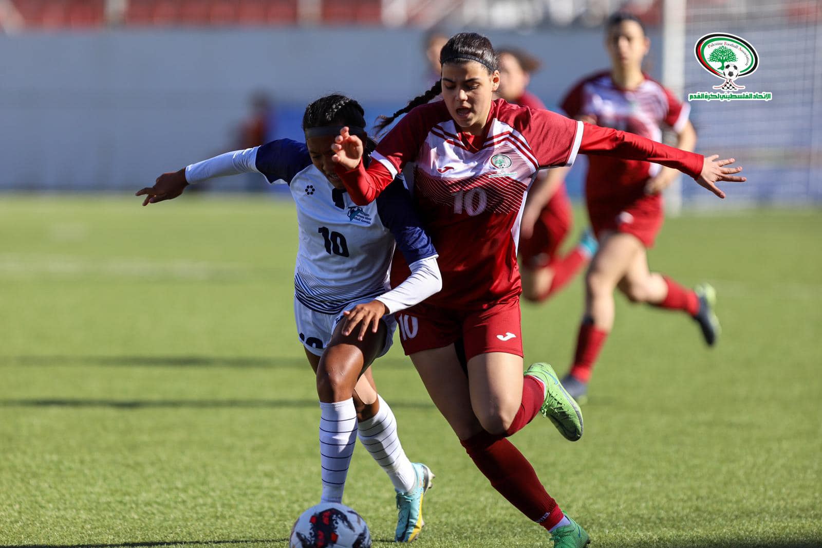 The NMI's Kaithlyn Chavez battles for possession during their match against host Palestine on Friday at the Faisal Al-Husseini Stadium in the West Bank, Palestine.