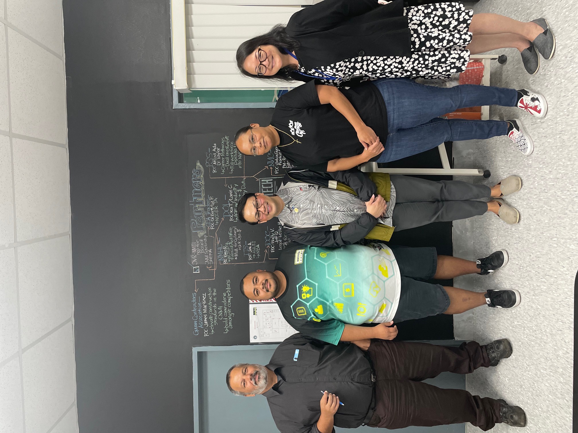 Northern Marianas Technical Institute Chief Executive Officer Jodina Attao, second right, Office of Vocational Rehabilitation Director James Rayphand, left, with NMTEch marketing and outreach coordinator Benjamin Babauta, second left, OVR's Arlene Yamagishi and Sam Santos after the signing of a memorandum of understanding at the NMTech campus in Lower Base on Monday.