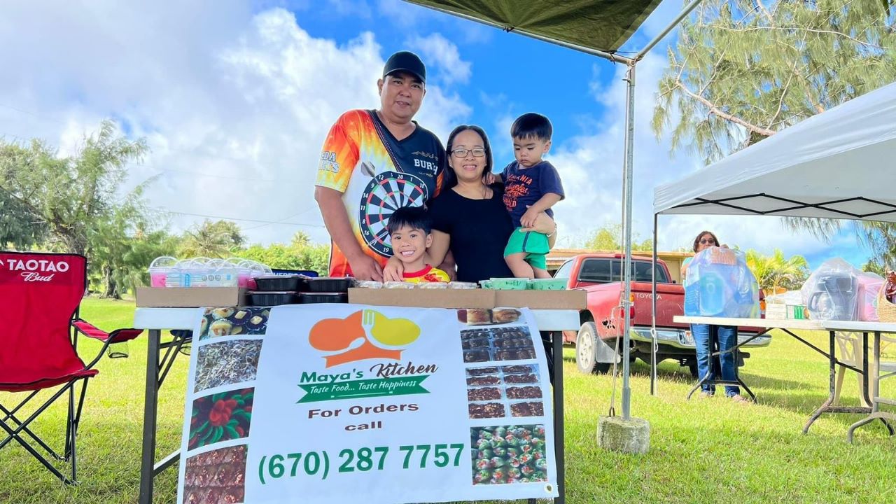 Mylene Canoza with her husband Burth Dacumos and two kids Vincent and Gabriel.