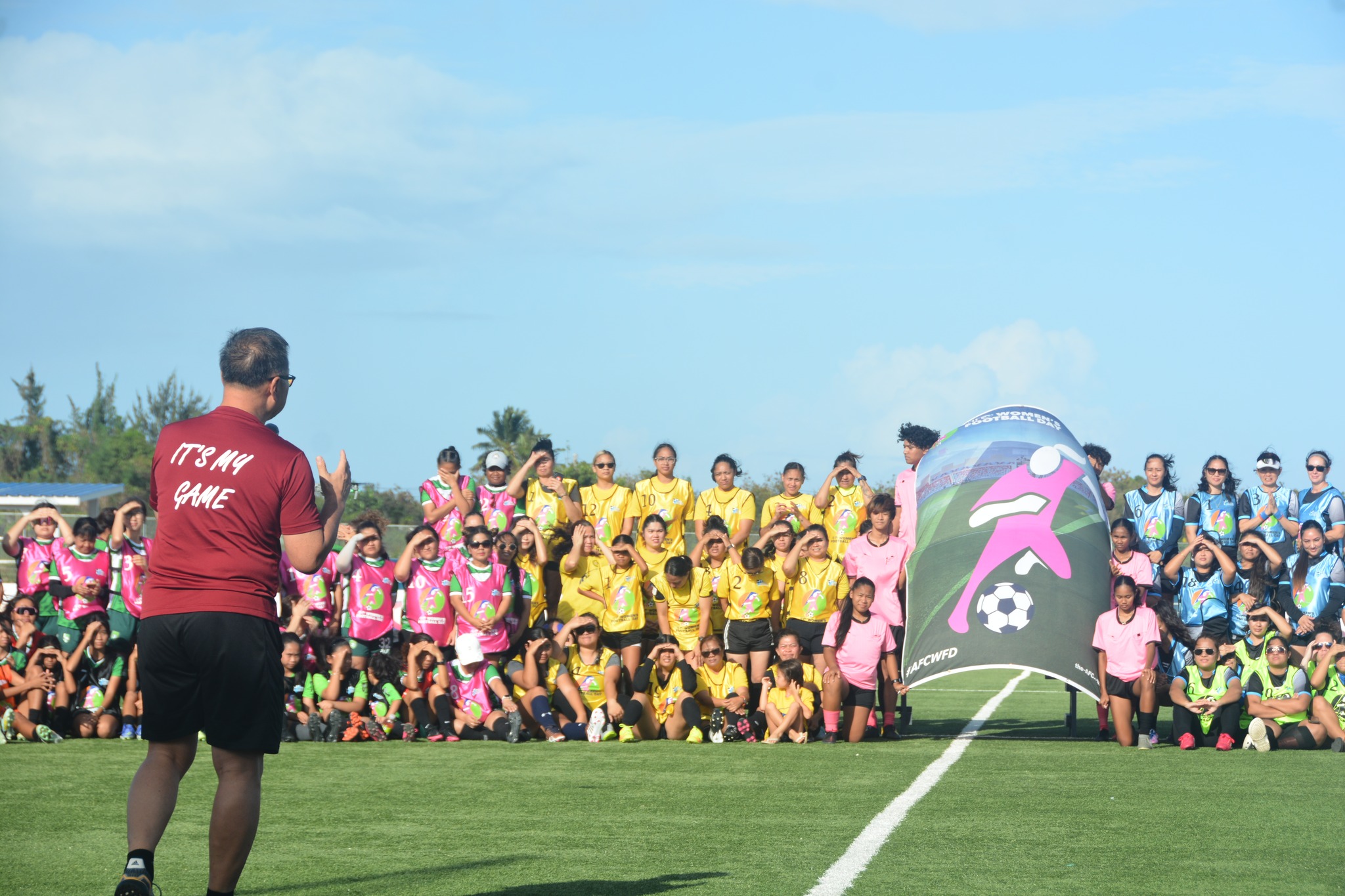 Northern Mariana Islands Football Association President Jerry Tan delivers his remarks to over 200  participants of the NMIFA-AFC Women's Football Day event Sunday at the NMI Soccer Training Center.