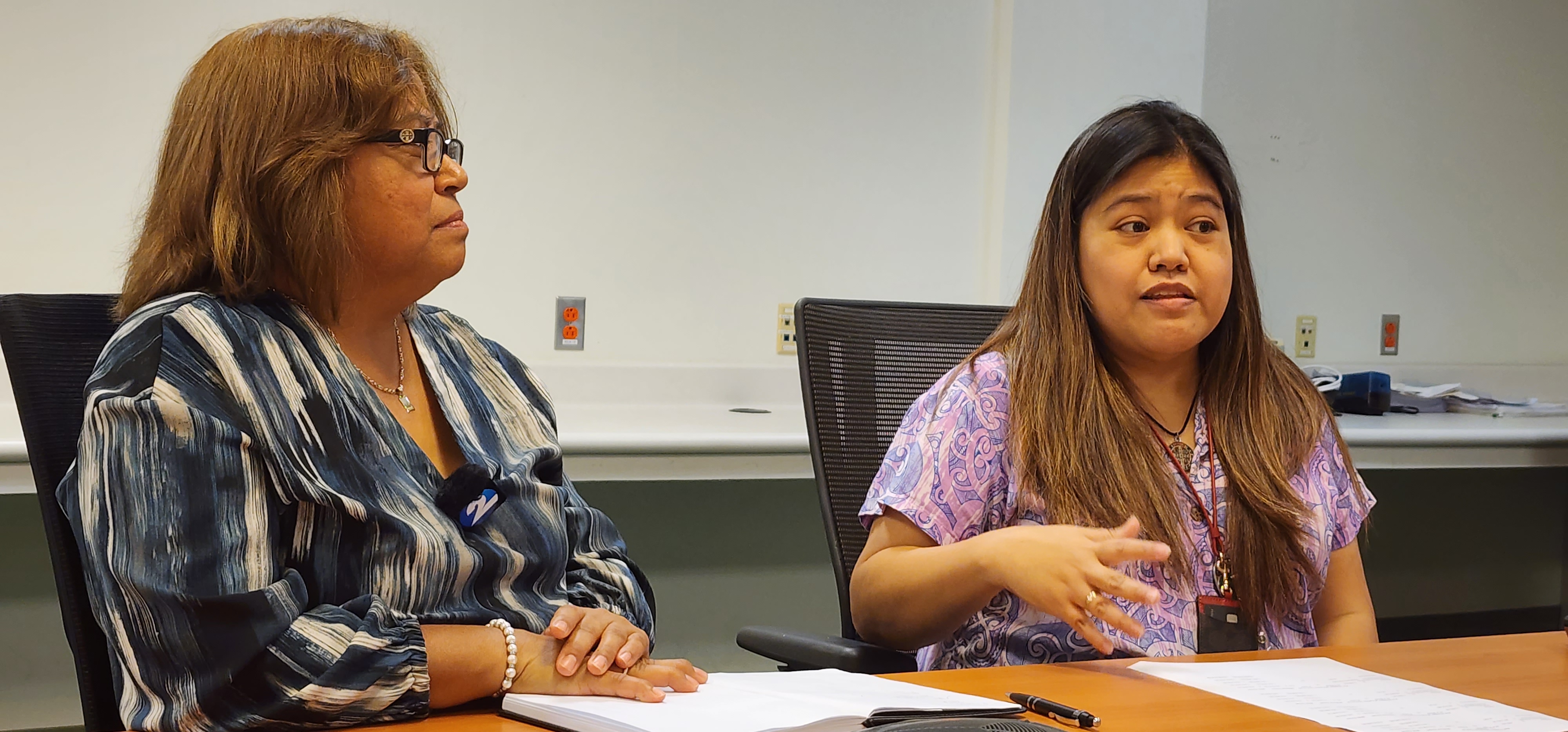 Commonwealth Healthcare Corp. Chief Executive Officer Esther Muna, left, looks on as Chief Financial Officer Perlita Santos talks about the financial challenges facing the medical referral program which is now known as the Health Network Program.
