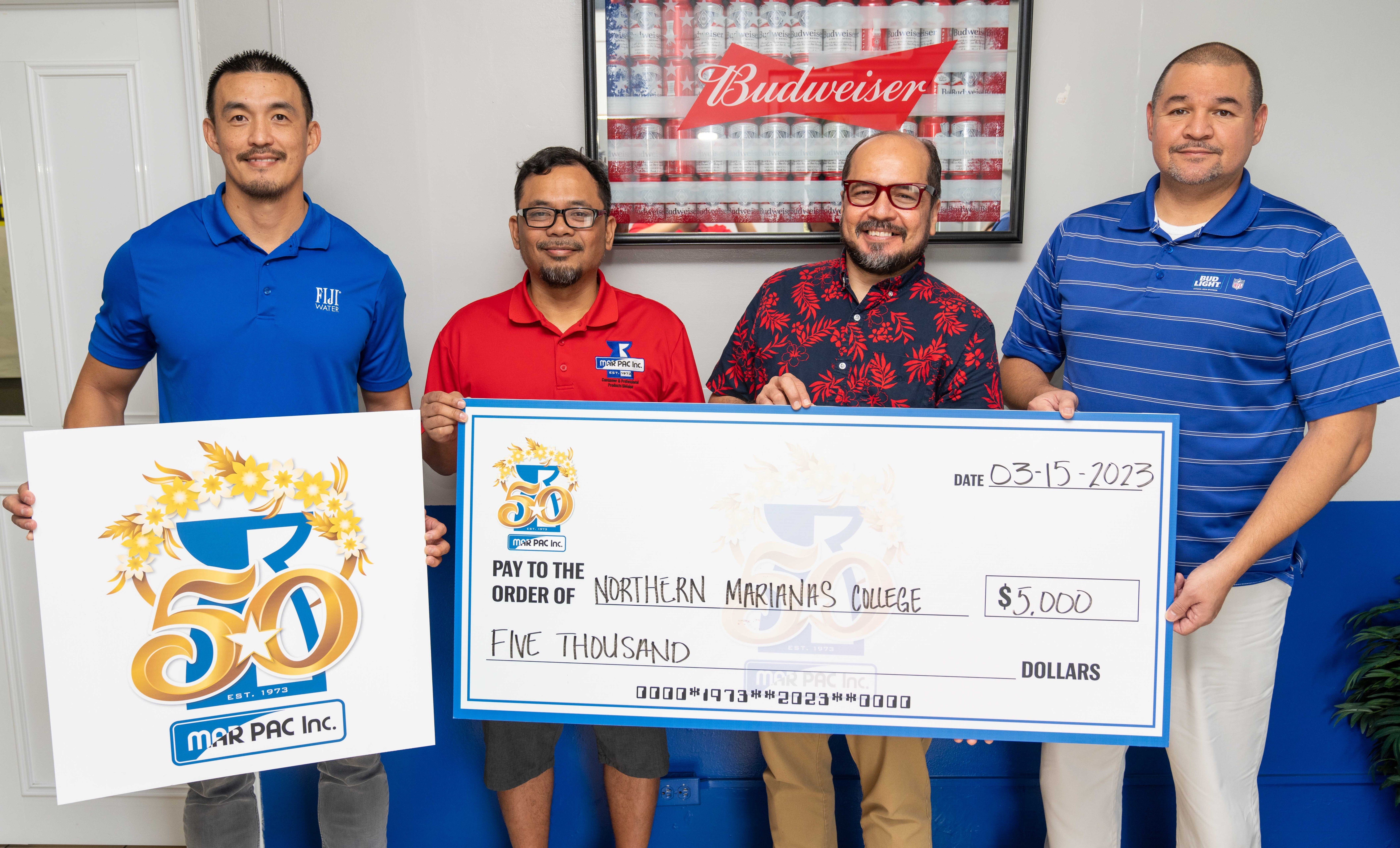 Marianas Pacific Distributors has donated $5,000 in cash, in-kind prizes, and beverages to the Northern Marianas College Foundation, in support of its Golf Open on March 18 and 19, 2023. In photo from left are Marpac Beverage Sales Manager James Lee, Marpac Consumer Manager Tom Basa, NMC President Galvin Deleon Guerrero, EdD, and Marpac Resident Manager Guy Pudney.