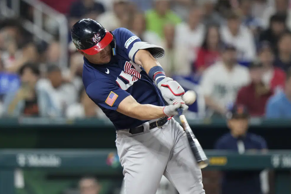 Mike Trout (27) of the U.S. hits a double during first inning of a World Baseball Classic championship game against Japan, Tuesday, March 21, 2023, in Miami.