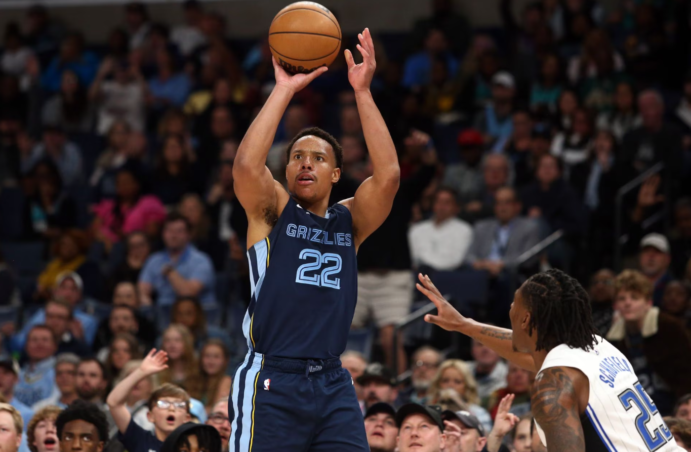 Memphis Grizzlies guard Desmond Bane (22) shoots for three during the second half against the Orlando Magic at FedExForum in Memphis, Tennessee, March 28, 2023.